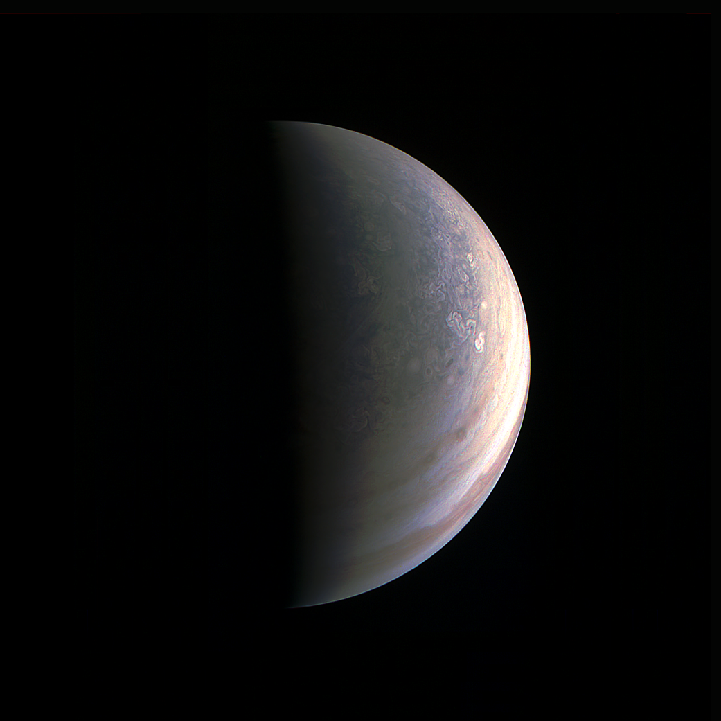 The JunoCam instrument obtained this view of Jupiter on August 27, about two hours before closest approach, when the spacecraft was 120,000 miles (195,000 kilometers) away from the giant planet (i.e., for Jupiter's center). (NASA/JPL-Caltech/SwRI/MSSS)