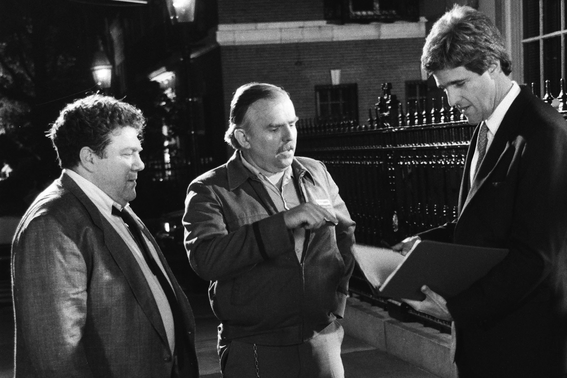 From left: George Wendt, John Ratzenberger and John Kerry on Cheers, 1991.