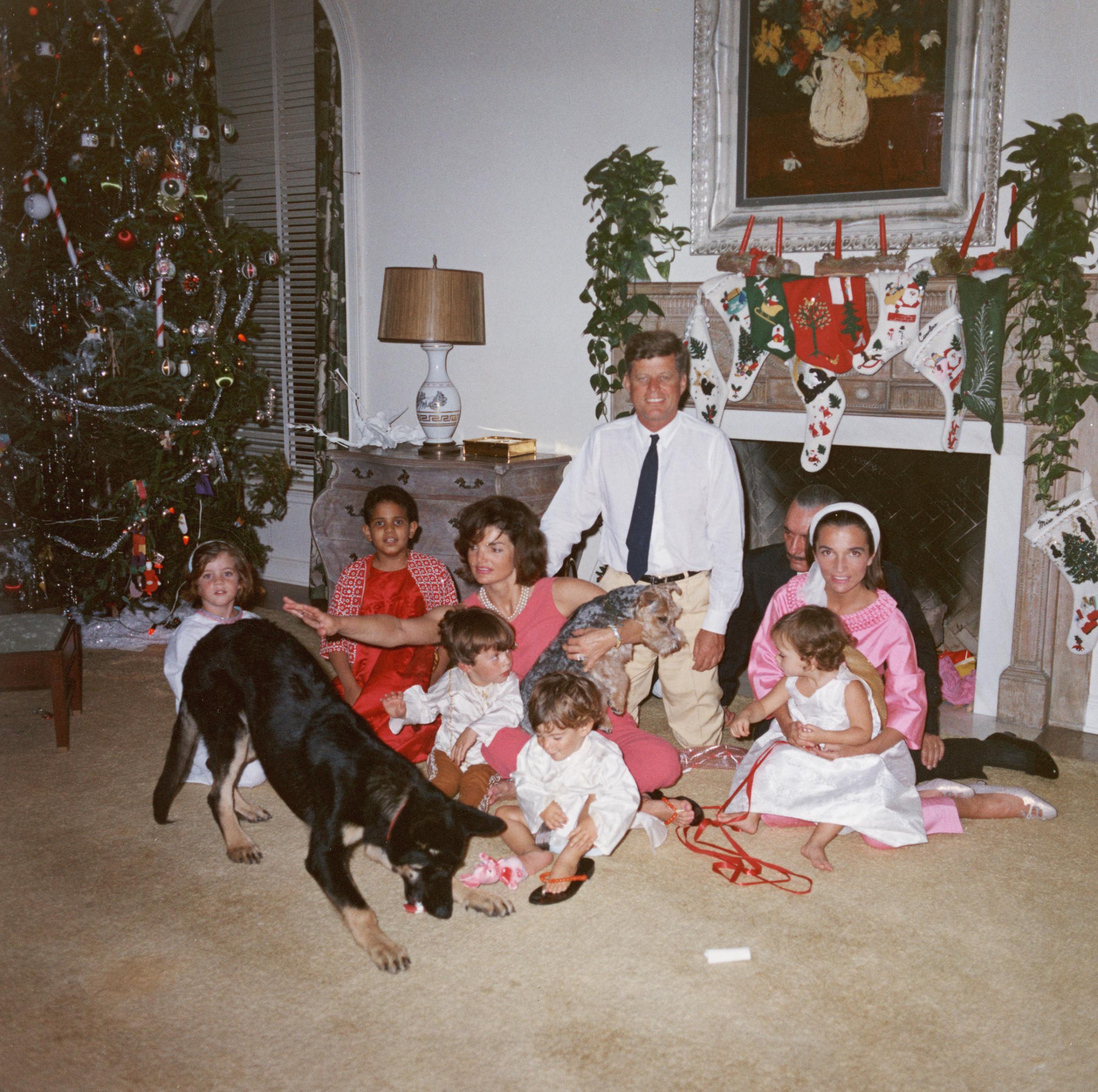 John F. Kennedy and Jacqueline Kennedy pose with their family on Christmas Day at the White House, Dec. 25, 1962.