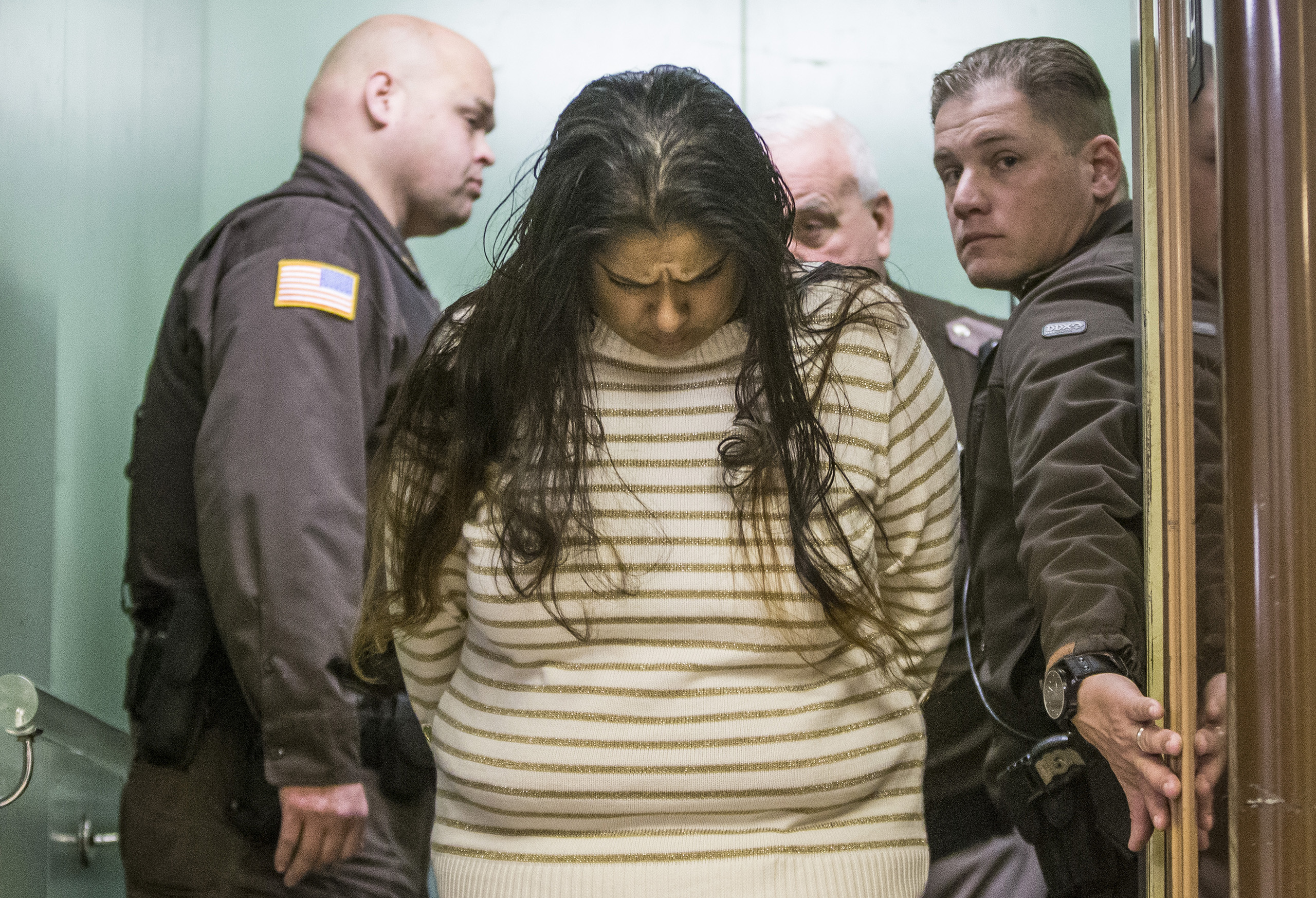 Purvi Patel is taken into custody after being sentenced to 20 years in prison for feticide and neglect of a dependent, at the St. Joseph County Courthouse in South Bend, Indiana, March 30, 2015. (Robert Franklin—AP)