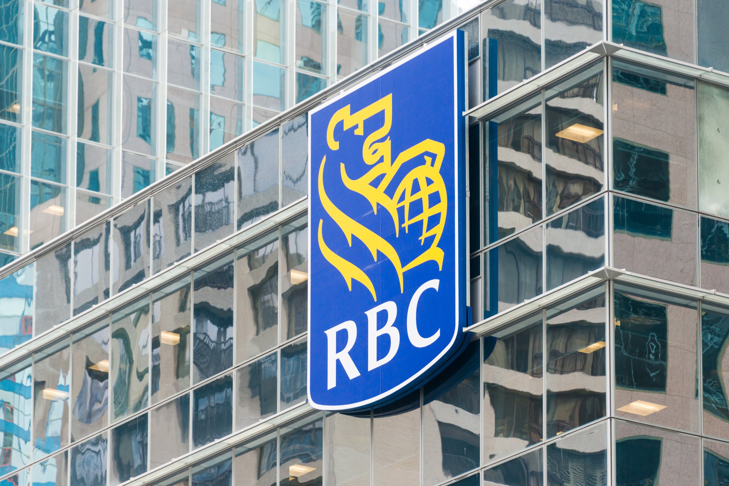 The symbol RBC on the glass facade of a building. The Royal