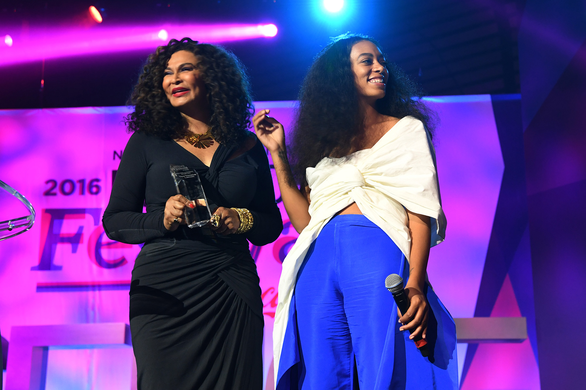 Tina Lawson Knowles and singer Solange Knowles speak on stage at the 2016 ESSENCE Festival in New Orleans, Louisiana.  (Photo by Paras Griffin/Getty Images for 2016 Essence Festival) (Paras Griffin&mdash;Getty Images for 2016 Essence Fe)
