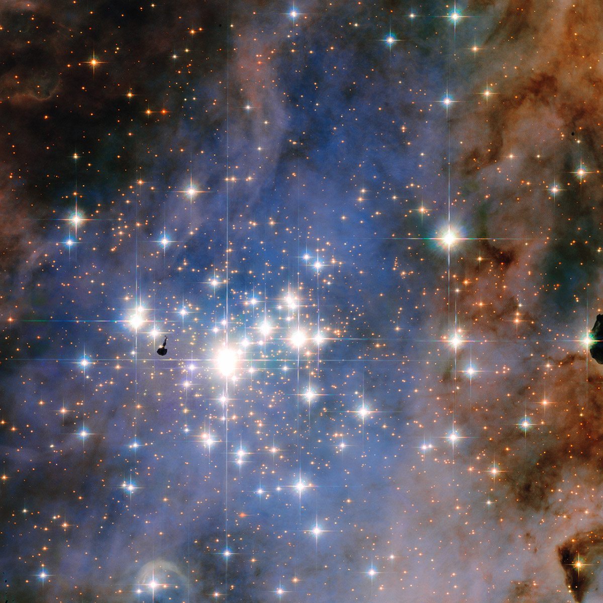 This image from NASA's Hubble Space Telescope shows Trumpler 14, a glittering star cluster that contains a collection of some of the brightest stars seen in our Milky Way galaxy, Jan. 21, 2016.