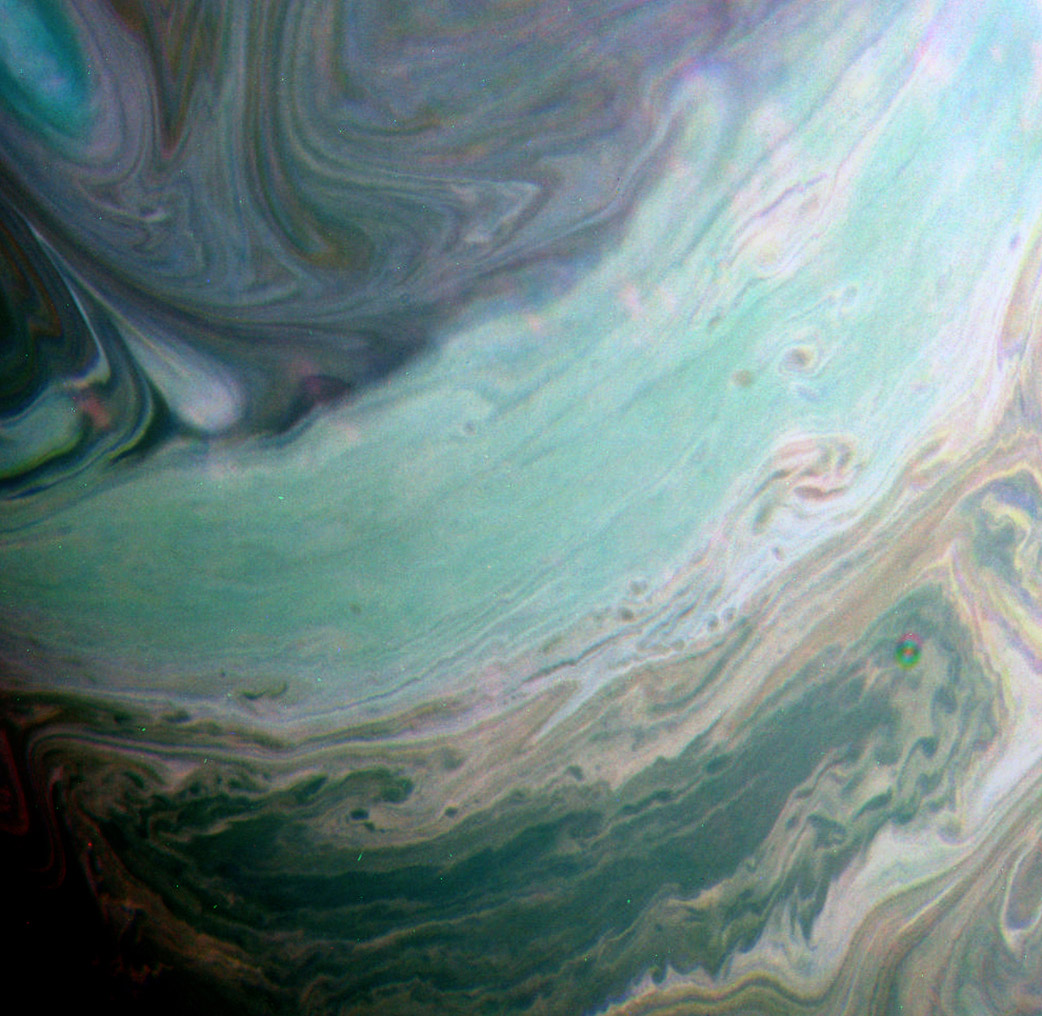 This false-color view from NASA's Cassini spacecraft shows clouds in Saturn's northern hemisphere. The view was made using a combination of spectral filters sensitive to infrared light at 750, 727 and 619 nanometers. Filters like these, which are sensitive to absorption and scattering of sunlight by methane in Saturn's atmosphere, have been useful throughout Cassini's mission for determining the structure and depth of cloud features in the atmosphere. July 20, 2016.