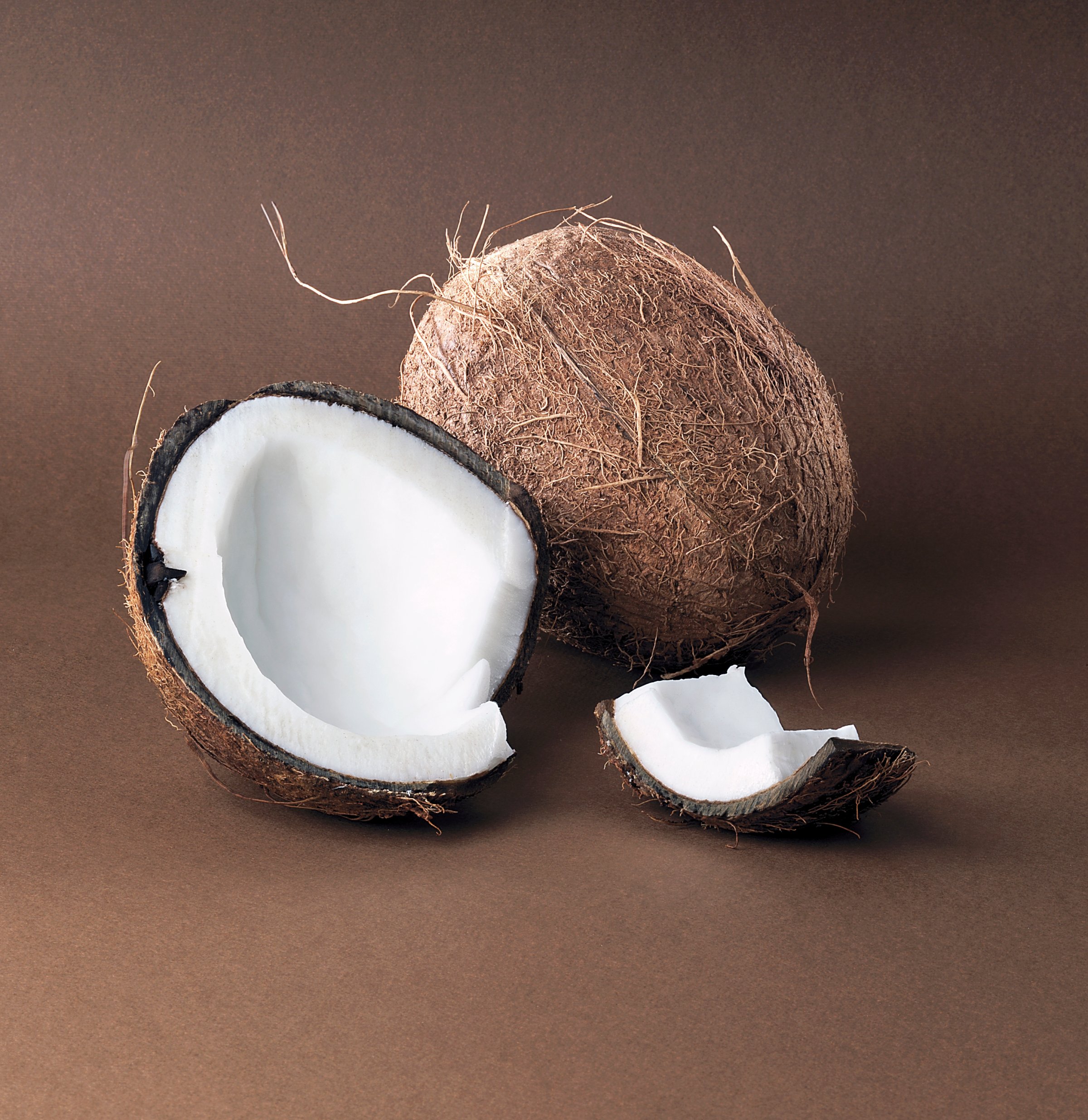 Whole and split coconut