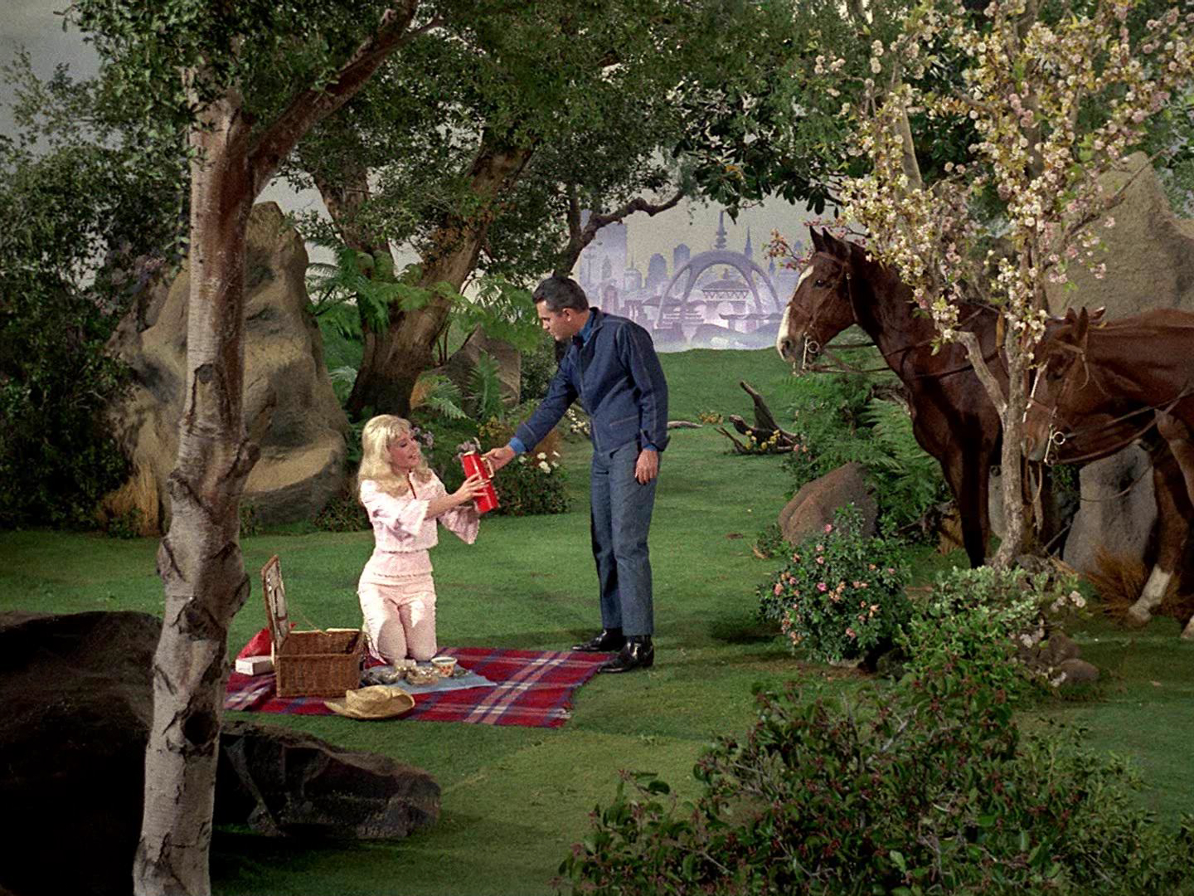 Susan Oliver as Vina and Jeffrey Hunter as Captain Christopher Pike have an illusory picnic outside Mojave, Kirk's home.