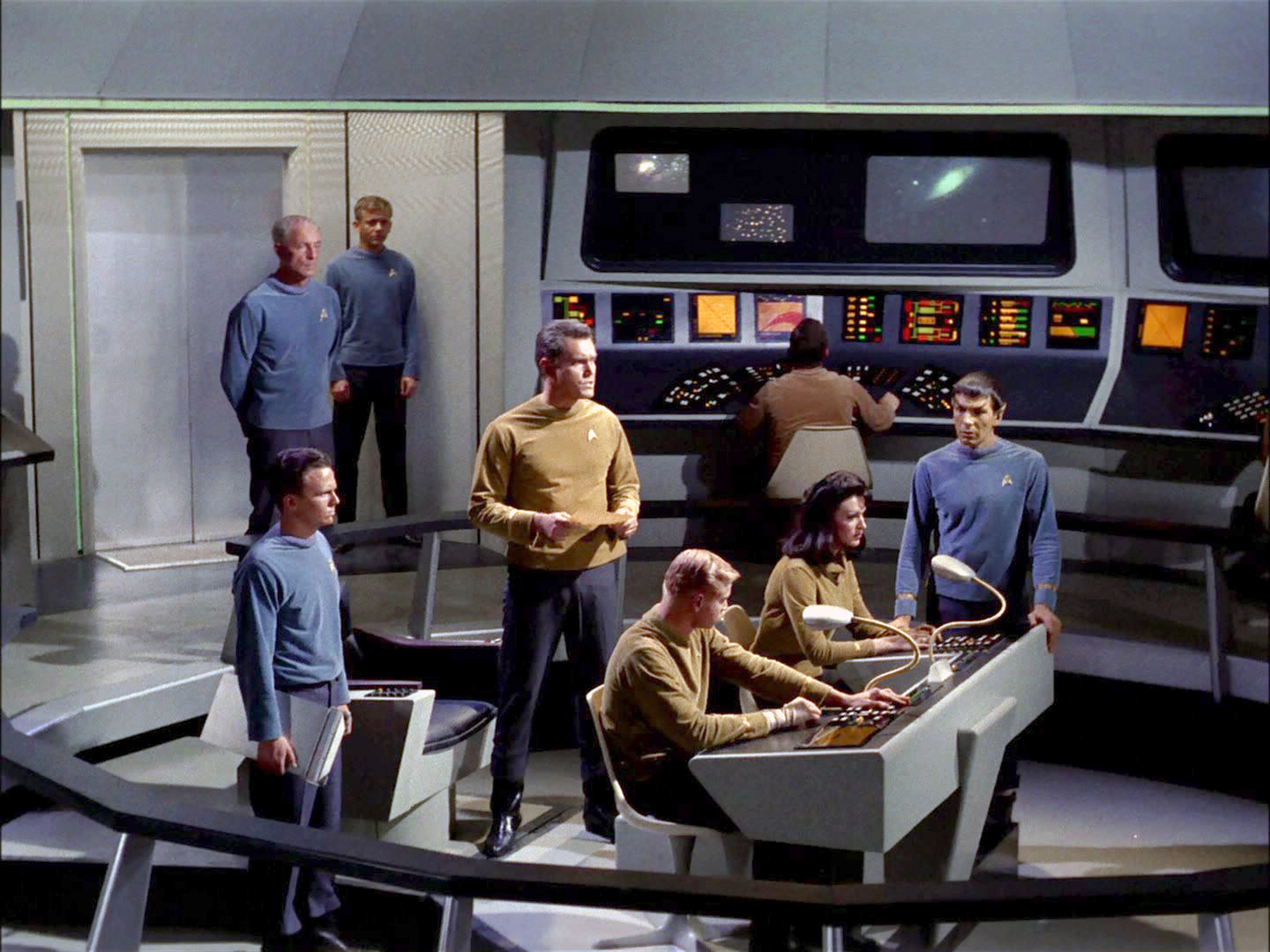 The crew on the bridge of the USS Enterprise.