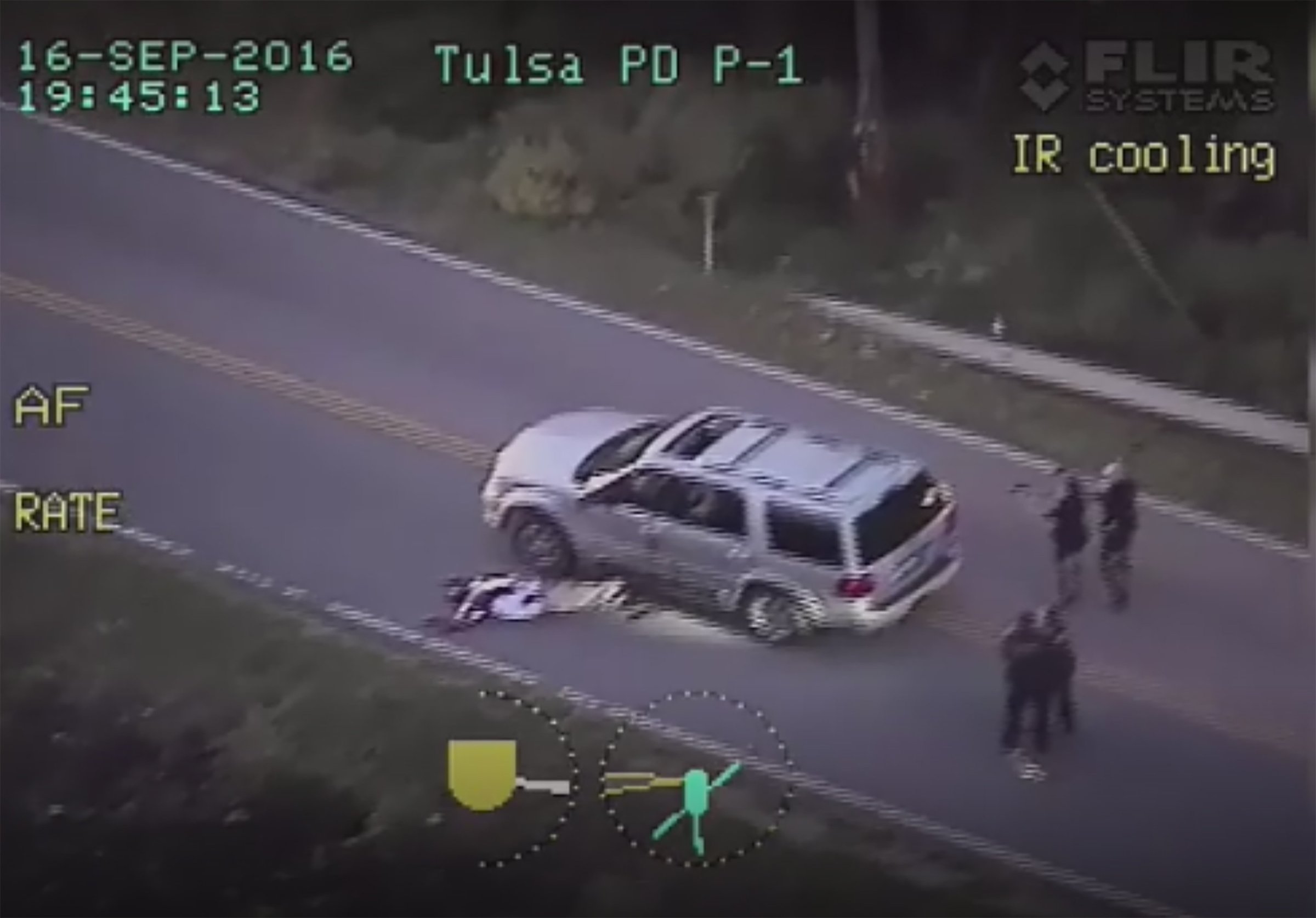 An image from a police helicopter video provided Sept. 20, 2016 by the Tulsa Police Department in Tulsa, Oklahoma, shows the officer involved shooting of Terence Crutcher.