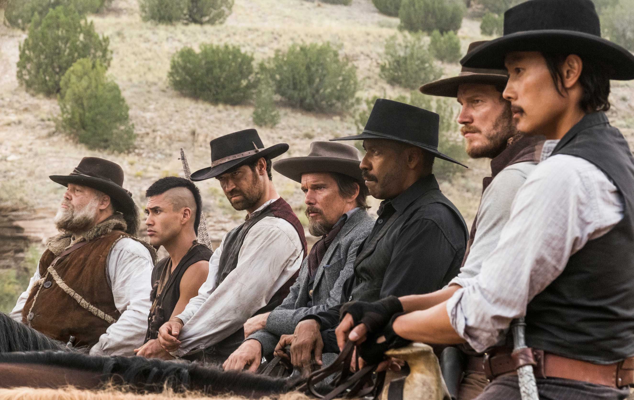 (l to r) Vincent D'Onofrio, Martin Sensmeier, Manuel Garcia-Rulfo, Ethan Hawke, Denzel Washington, Chris Pratt and Byung-hun Lee star in Metro-Goldwyn-Mayer Pictures and Columbia Pictures' THE MAGNIFICENT SEVEN. (Scott Garfield—Sony)