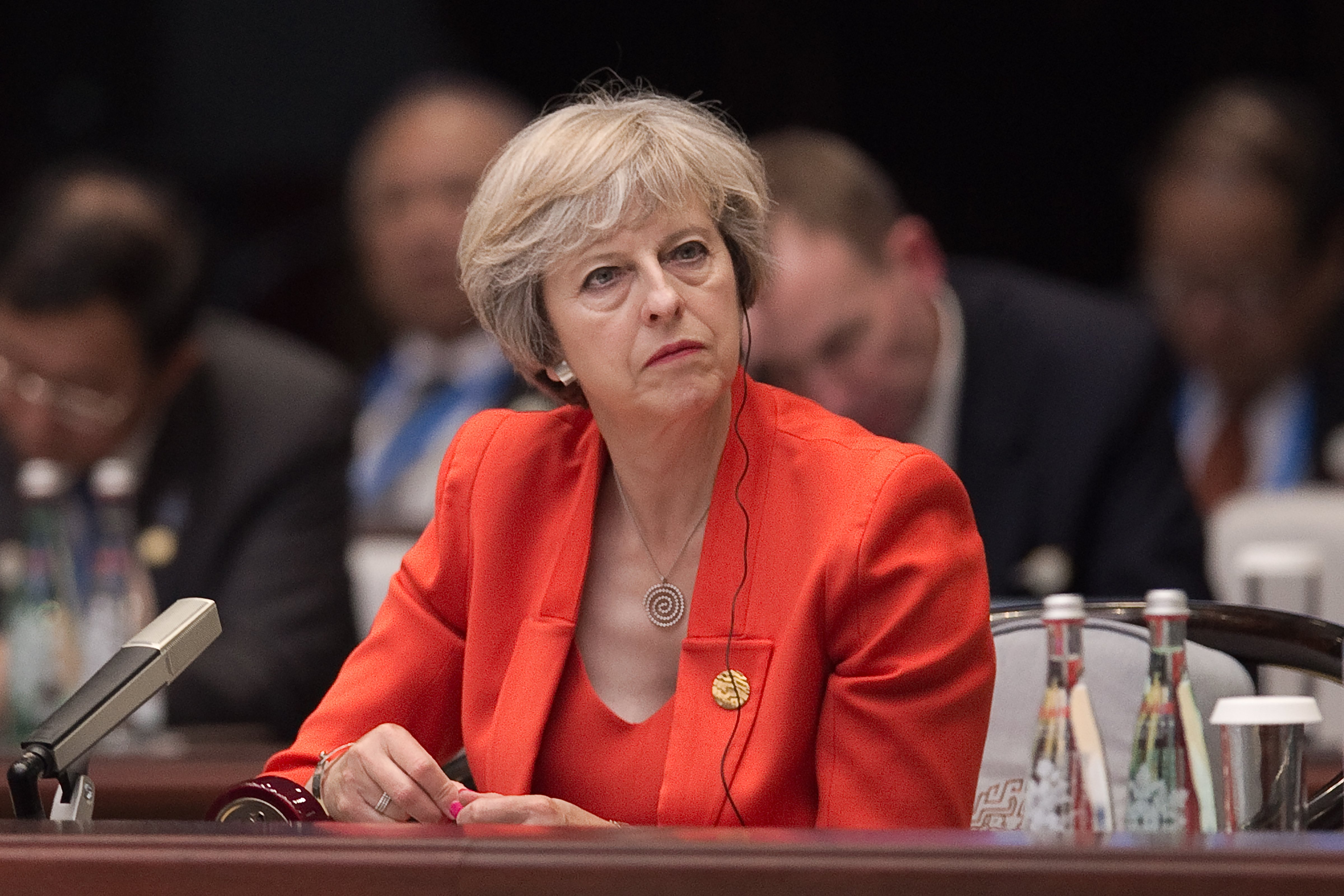 Britain's Prime Minister Theresa May listens to Chinese President Xi Jinping speech during the opening ceremony of the G20 Leaders Summit on September 4, 2016 in Hangzhou, China. (Nicolas Asfouri—Pool/Getty Images)