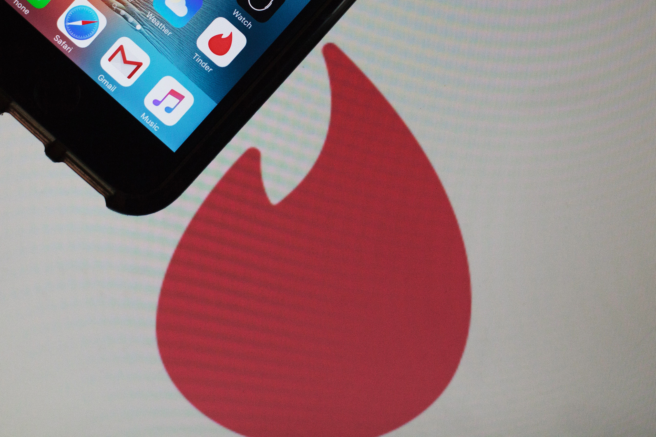 The Tinder Inc. application icon is displayed on a smartphone in New Delhi, India, on July 29, 2016. (Sara Hylton—Bloomberg/Getty Images)