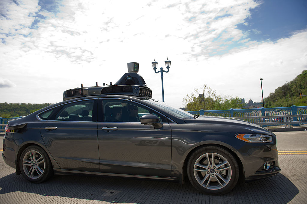 An Uber automated-vehicle taking a test-drive on the 31st Street Bridge. The company has moved engineers and leased land throughout the Pittsburgh region in efforts to transform transportation for the world.