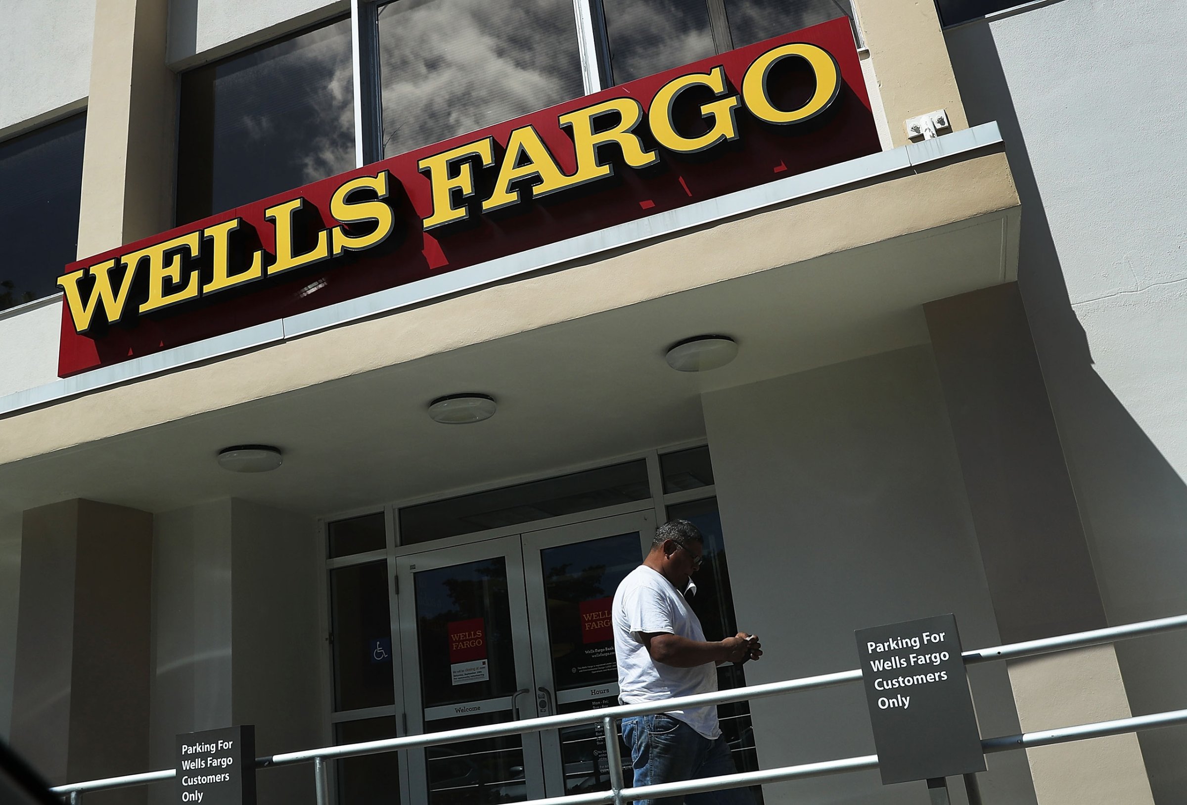 A Wells Fargo sign is seen on the exterior of one of their bank branches in Miami on September 9, 2016.
