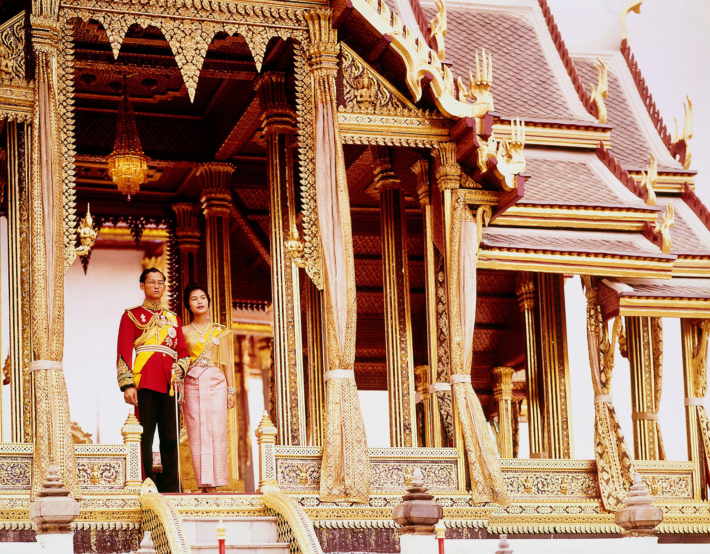 Thailand's King Bhumibol Adulyadej (aka Phumiphon Aduldet) with wife Queen Sirikit at the Palace, 1960.