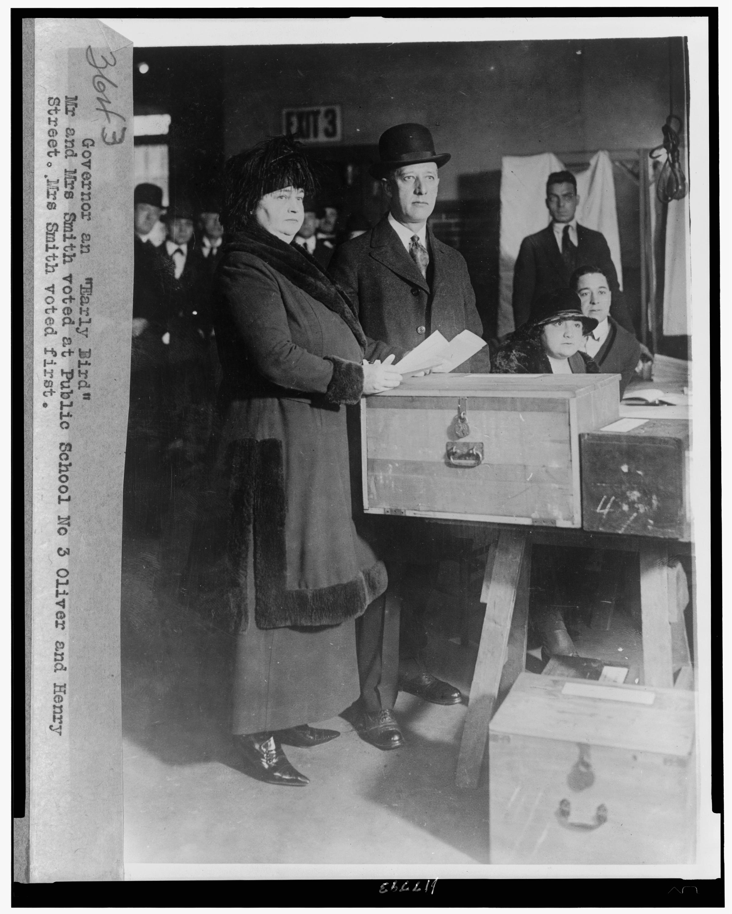 Governor an "early bird"--Mr. and Mrs. Smith voted at Public School No. 3, Oliver and Henry Street  [between 1919 and 1928]