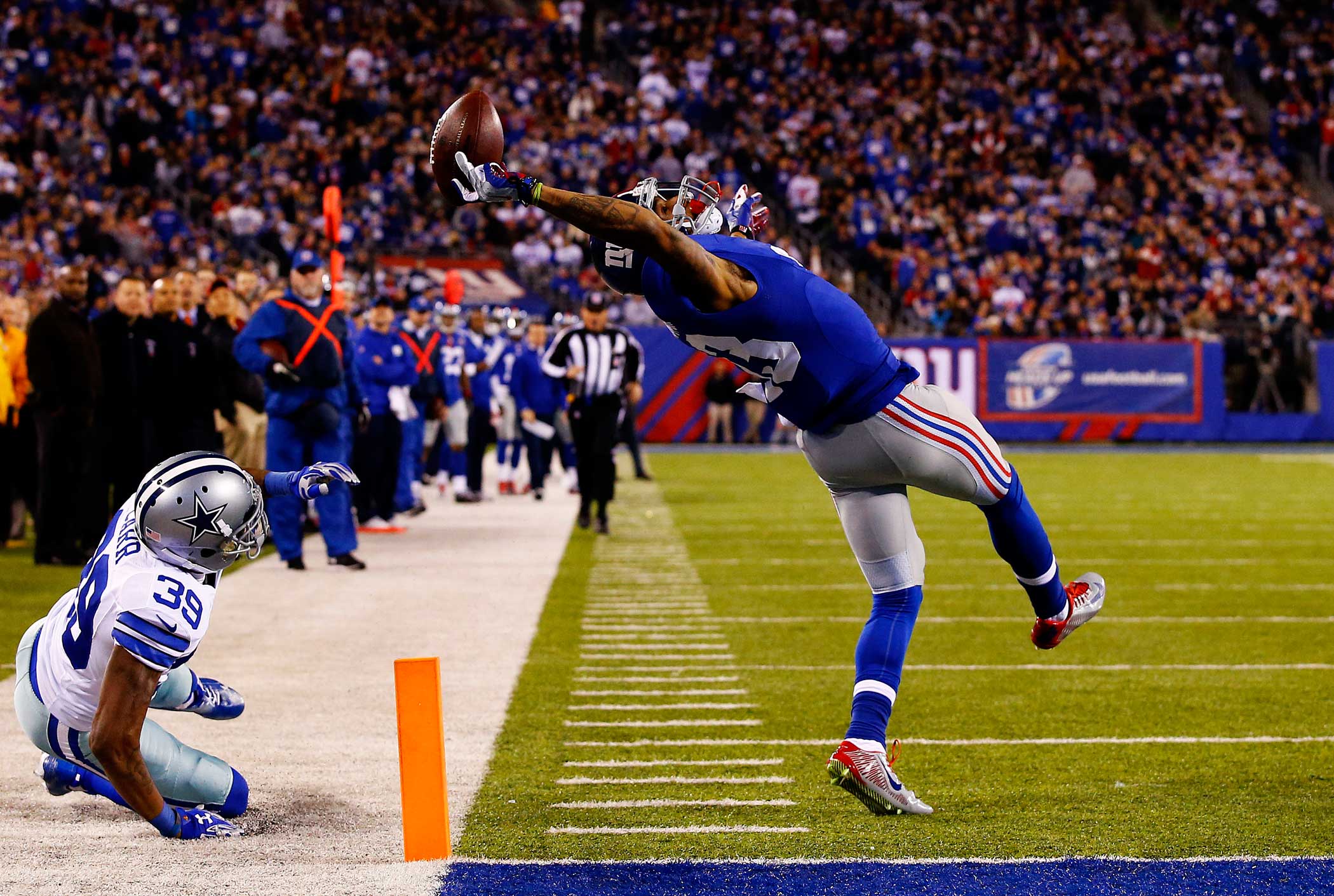 Odell Beckham of the New York Giants scores a touchdown in the second quarter against the Dallas Cowboys at [f500link]MetLife[/f500link] Stadium on Nov. 23, 2014 in East Rutherford, New Jersey. (Al Bello—Getty Images)