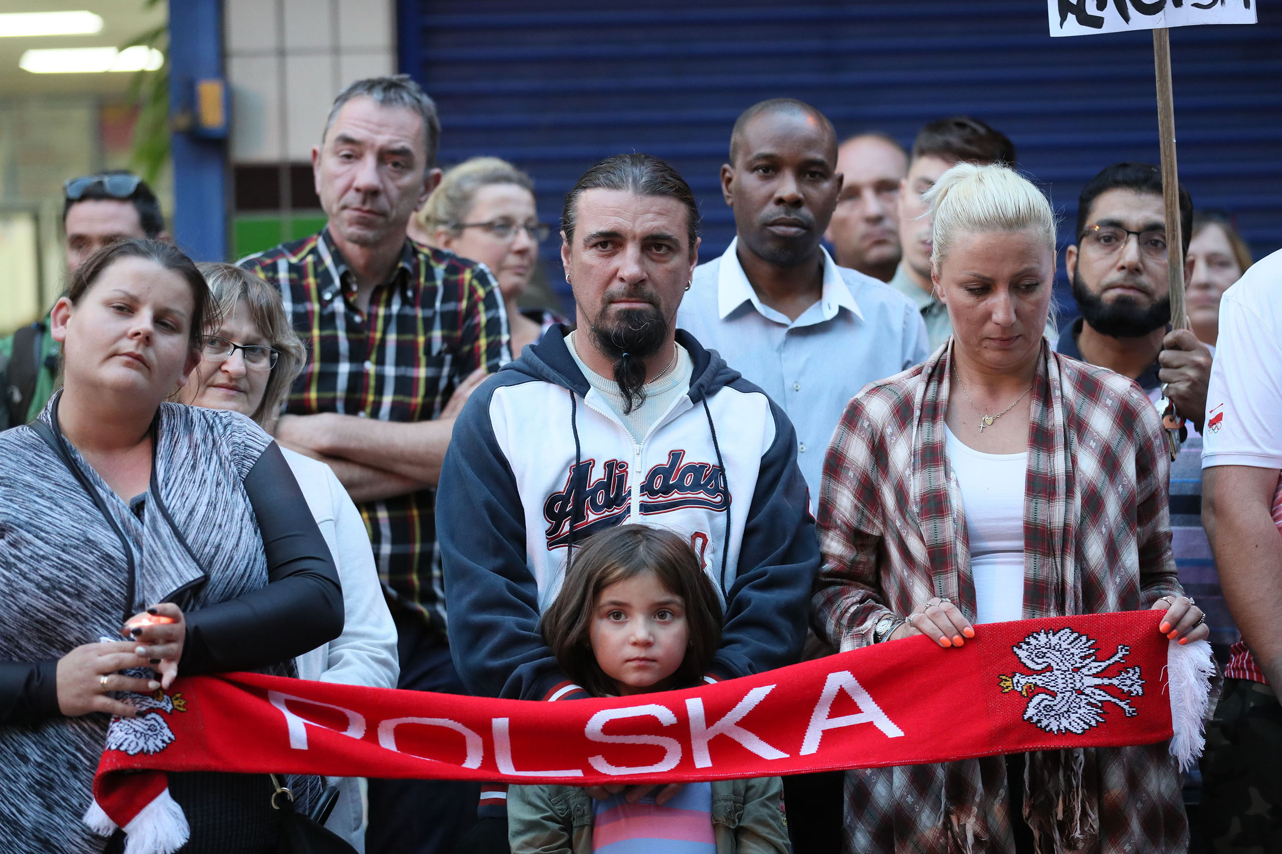 People attend a vigil to pay tribute to Arkadiusz Jozwik, a Polish man killed in a possible hate crime, in Harlow, Essex on Aug. 31, 2016. (Chris Radburn—PA Wire/AP)