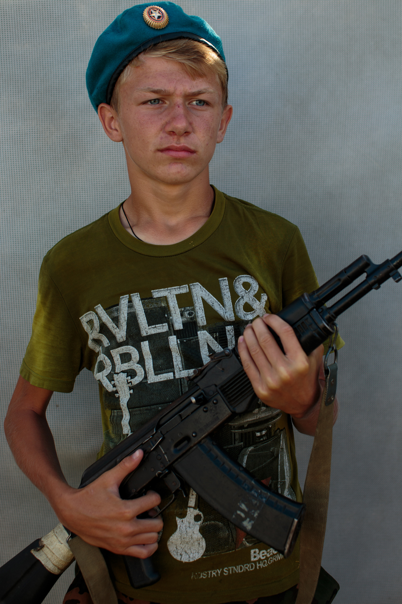 Vladimir Ribak, age 14, from Moscow poses with a real but non functional gun used solely for drills.