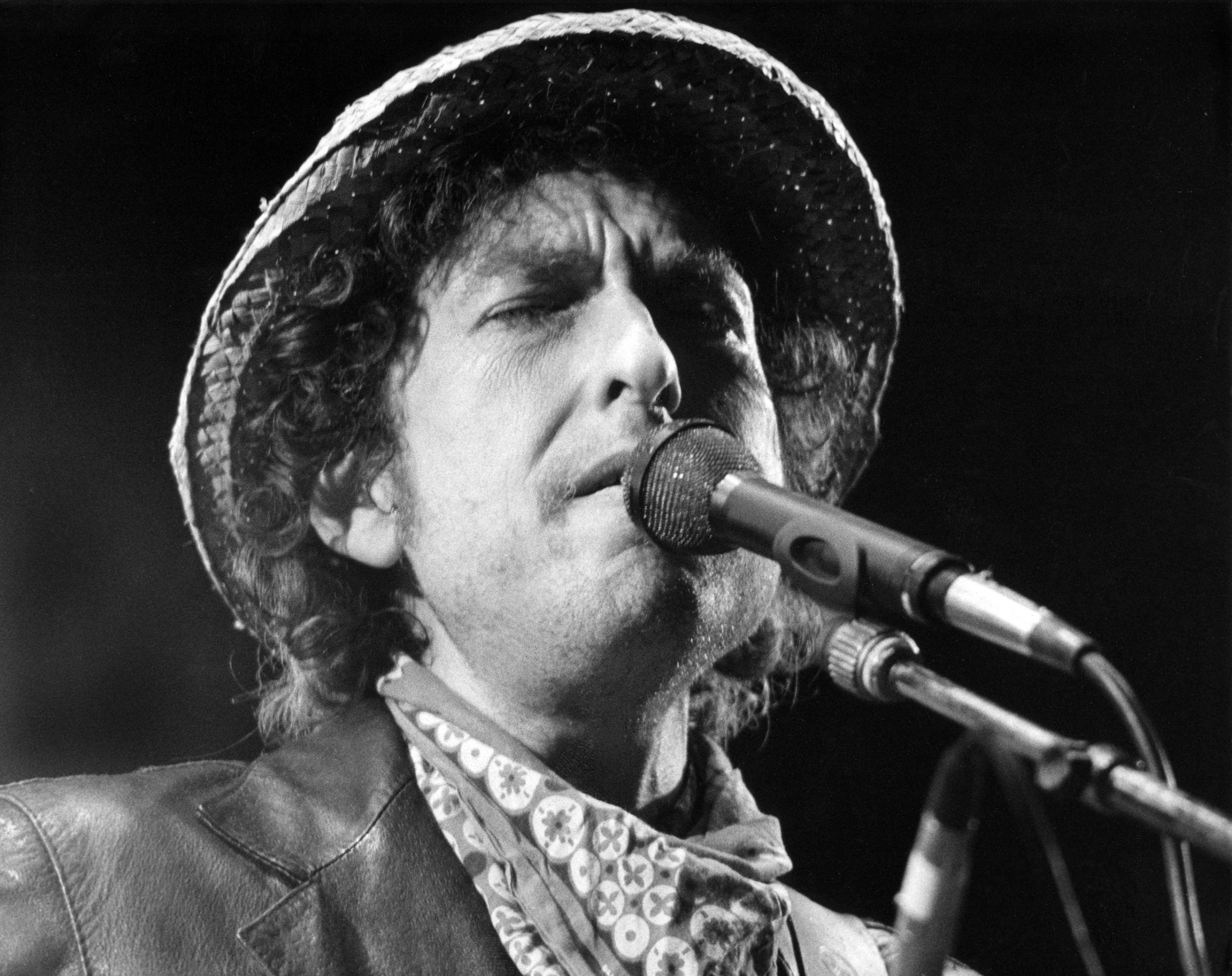 Bob Dylan performs during a concert at the Olympic stadium in Munich, southern Germany, on June 3, 1984. Dylan won the Nobel Prize in Literature on Oct. 13, 2016.