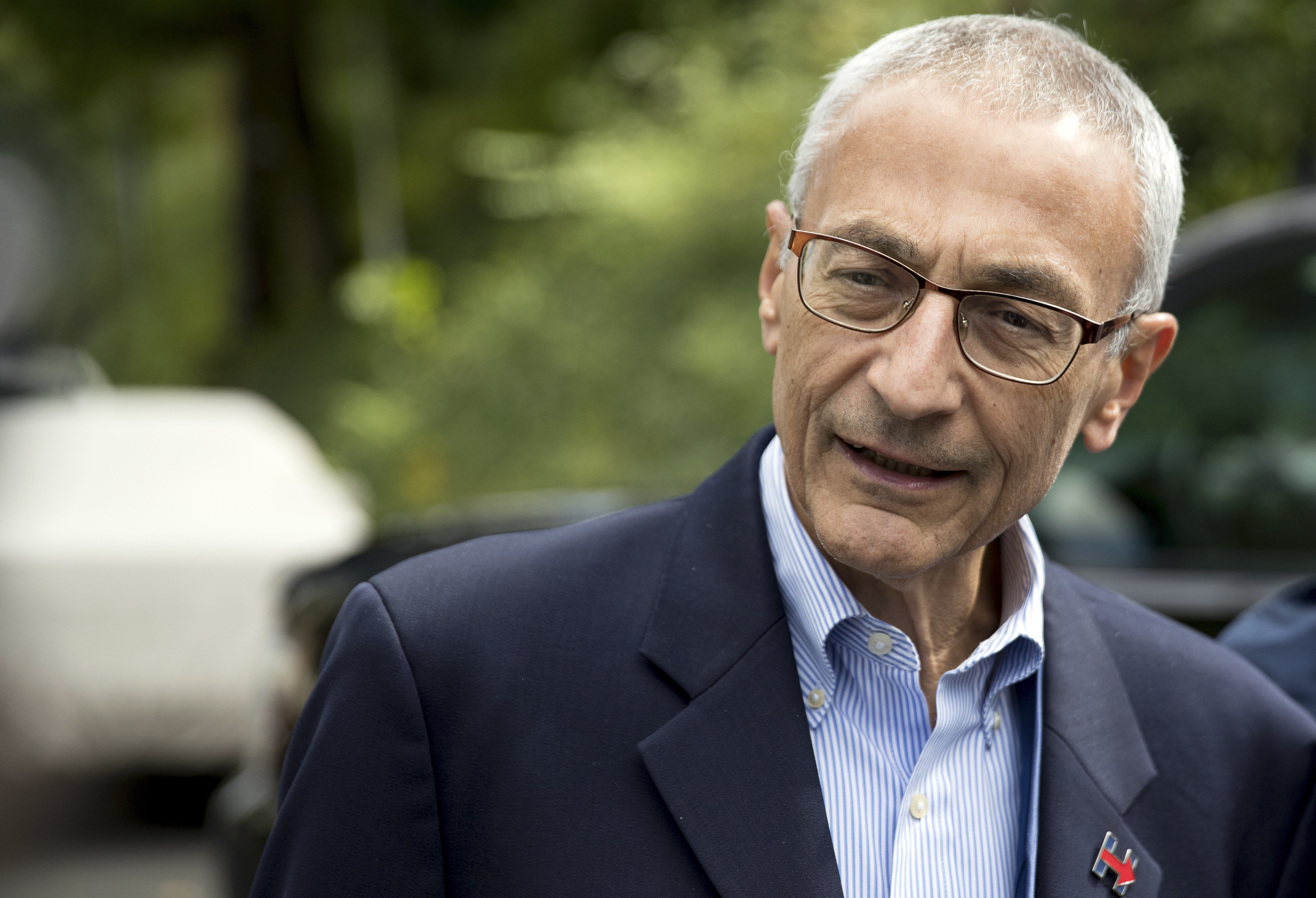 In this Oct. 5, 2016, photo, Hillary Clinton campaign chairman John Podesta speaks to members of the media outside Clinton's home in Washington. (Andrew Harnik—AP)