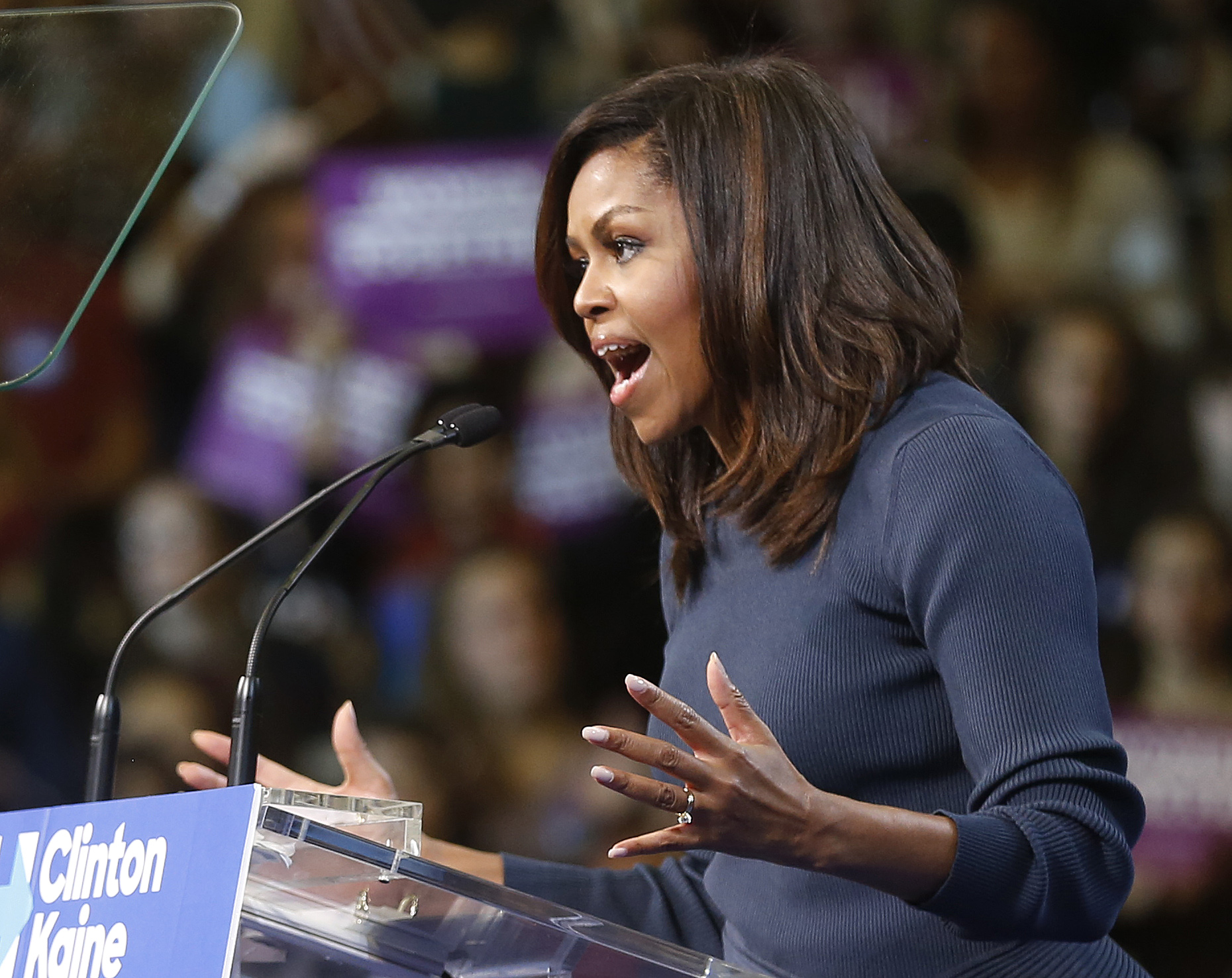 First Lady Michelle Obama speaks during a campaign rally for Democratic presidential candidate Hillary Clinton on Oct. 13, 2016, in Manchester, N.H. (Jim Cole—AP)