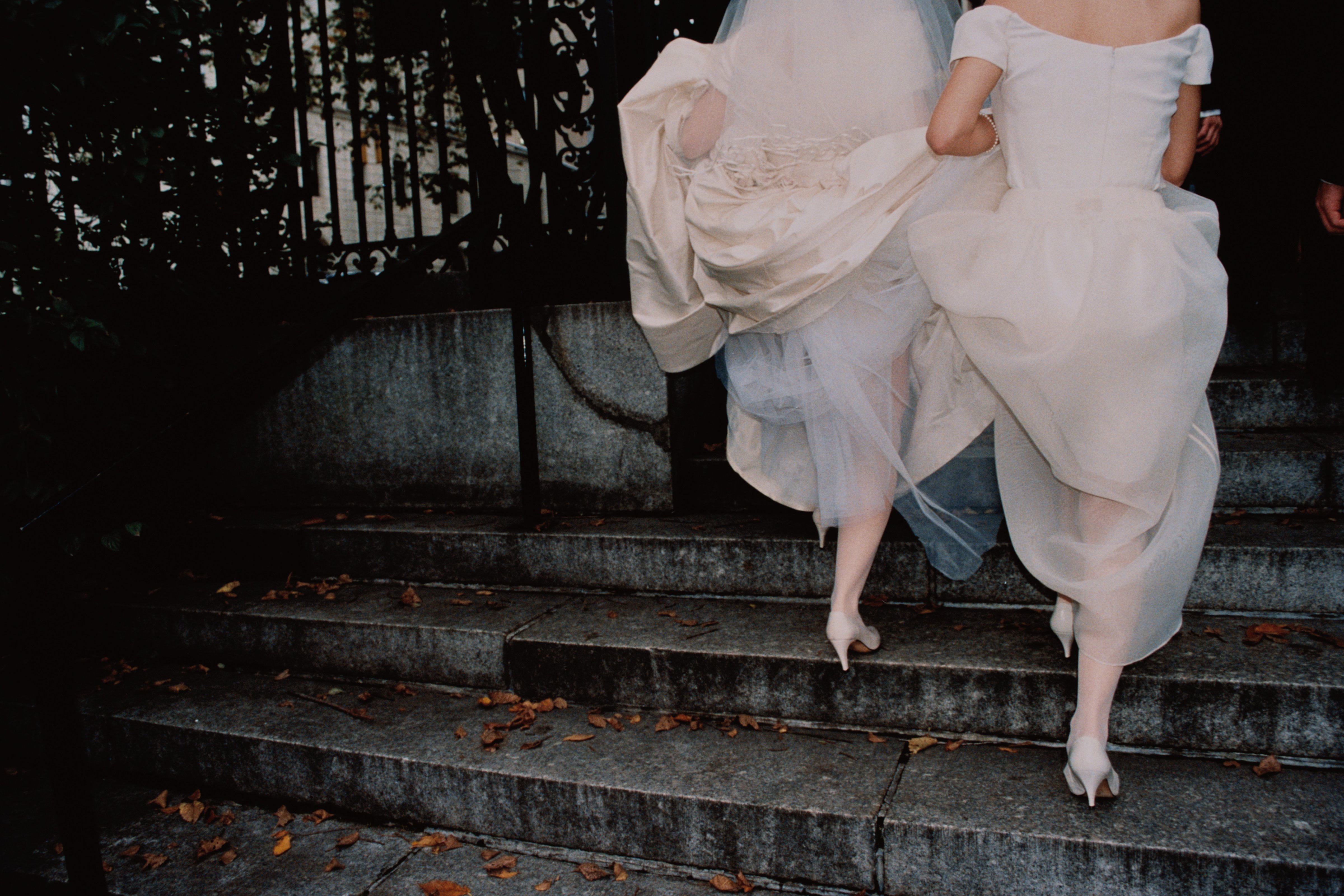 Bride and Bridesmaid on Steps