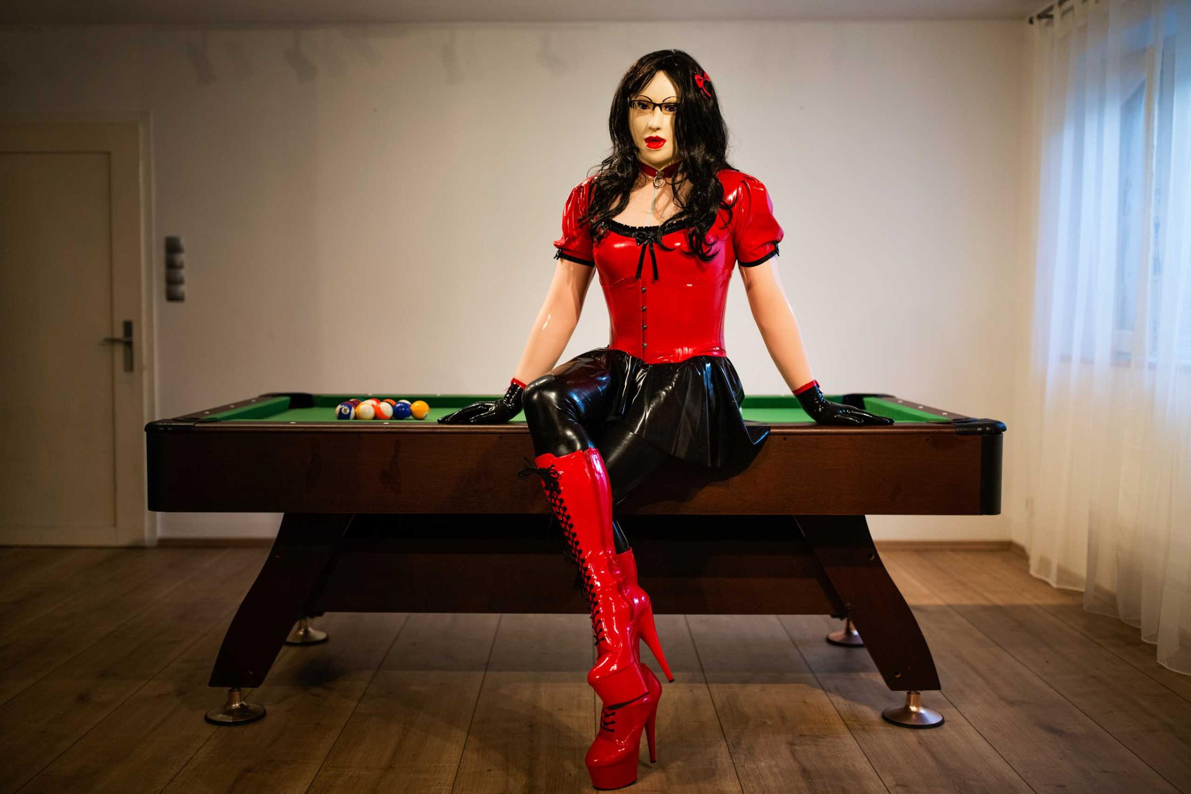 GÖPPINGEN, GERMANY - FEBRUARY 21, 2016: Female masker Manu, 34, alias Mina, poses for a portrait in his home on February 21, 2016 in Göppingen, Germany.'Giving up my manlihood by dressing as a rubberdoll exemplifies 'his bow to the beauty of femininity'.- Female Masker Manu, 34, alias Mina, heterosexual man