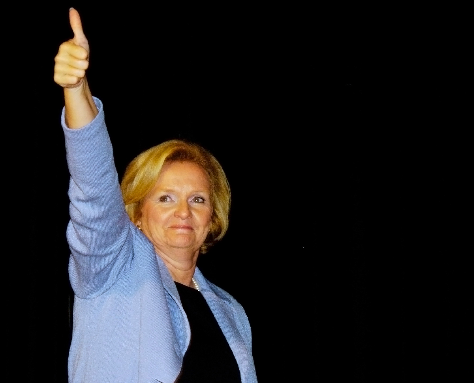 Claire McCaskill, Democratic Missouri U.S. Senate candidate, gestures to the crowd as she prepares to leave the stage with former U.S. President Bill Clinton during a rally Saturday, Sept. 9, 2006, at The Pageant theater in St. Louis.