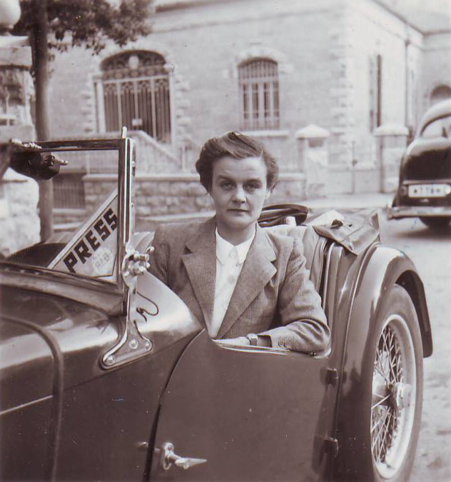 Clare Hollingworth in a car, likely late 1940s, early 1950s.