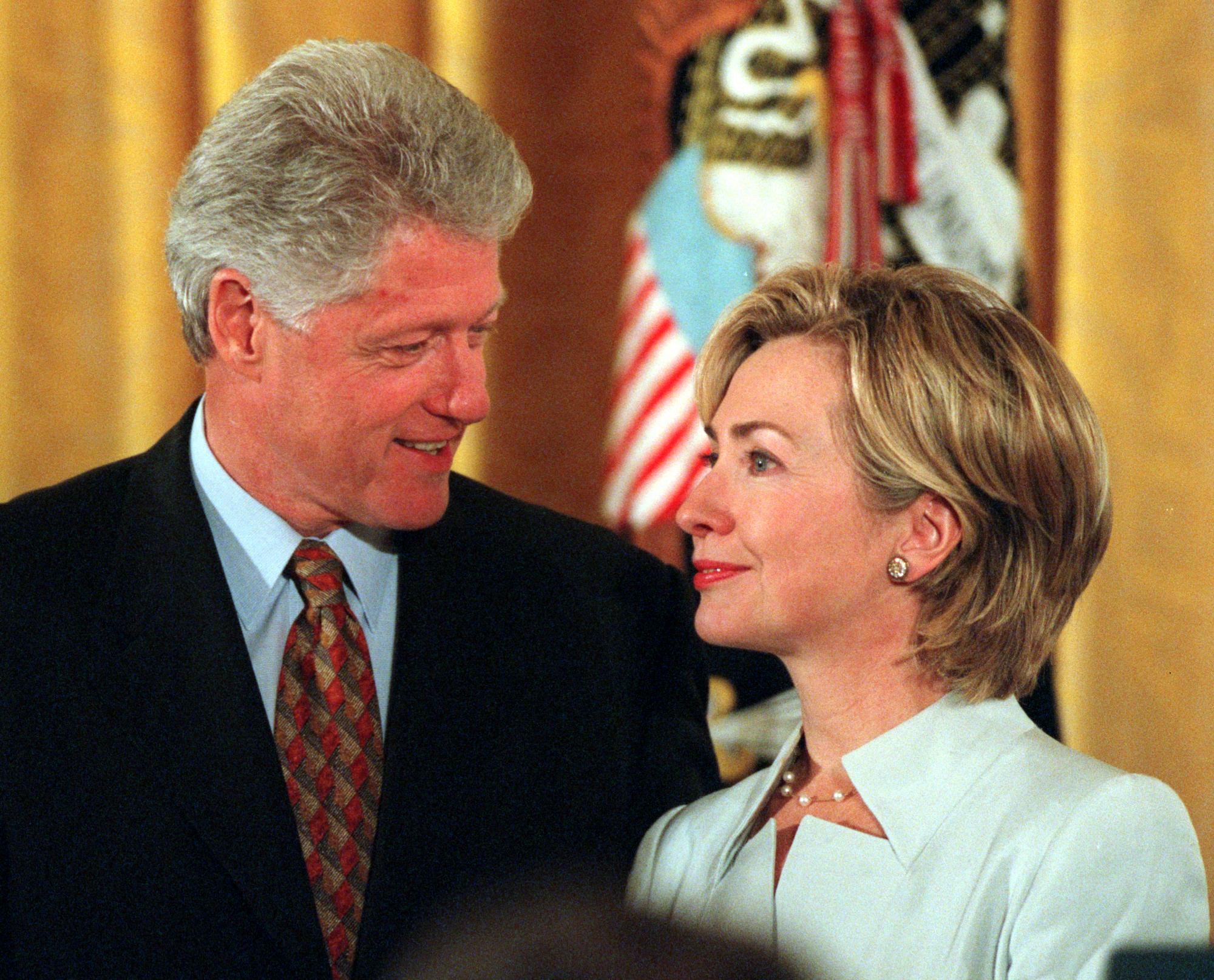 President Bill Clinton with First Lady Hillary Clinton during the Congressional Medal of Freedom ceremony in the east room of the White house. Picture taken Wednesday, August 11, 1999. (AP Photo/Virginian-Pilot, LAWRENCE JACKSON)