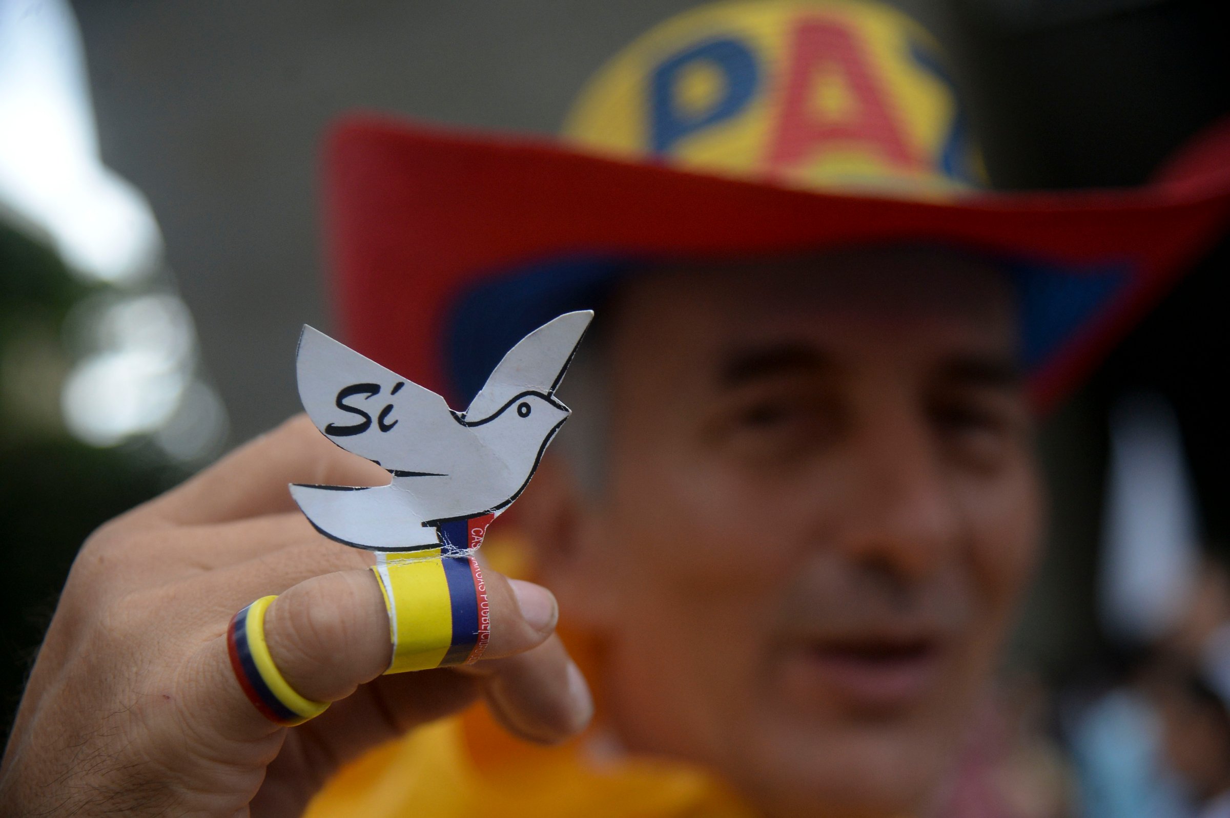 Picture taken during a march for peace through the streets of Medellin, Colombia, on October 7, 2016 just days after voters shot down a historic peace accord between the government and the Revolutionary Armed Forces of Colombia (FARC) to end the war.