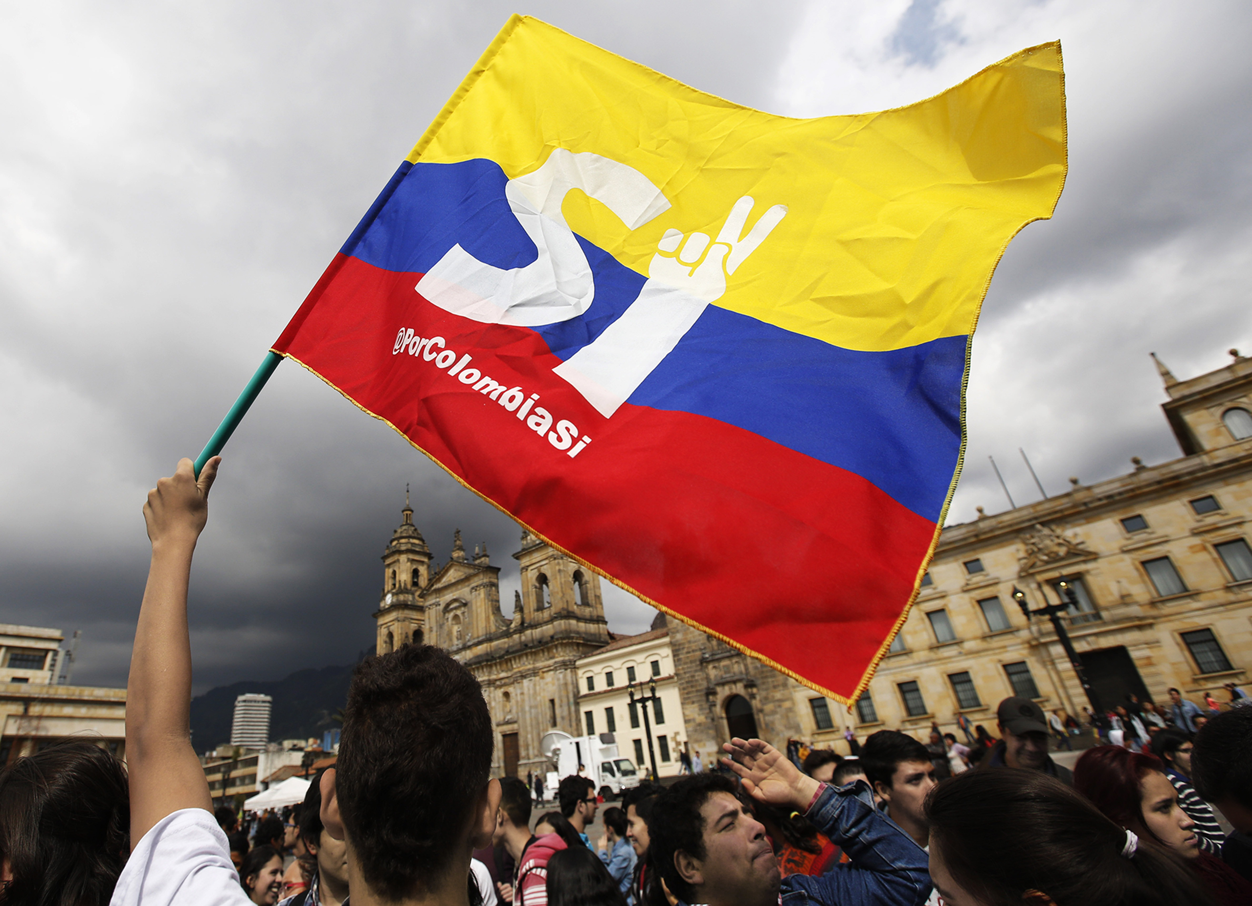 A peace-deal supporter at a rally in Bogotá a day after the vote (Fernando Vergara—AP)