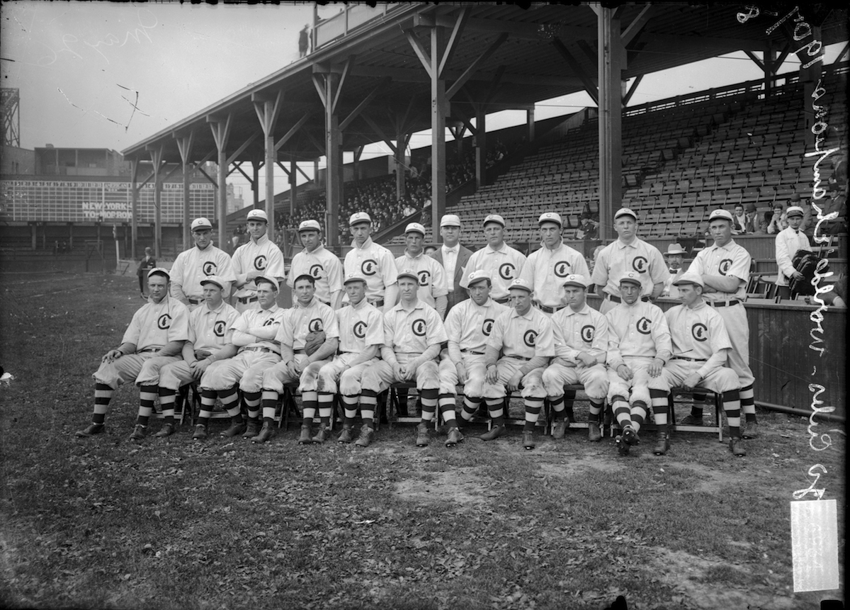 Group portrait of National League's Chicago Cubs baseball team players, World Champions 1908, posing for a photograph on the field at West Side Grounds, Chicago, 1908. (Chicago History Museum / Getty Images)