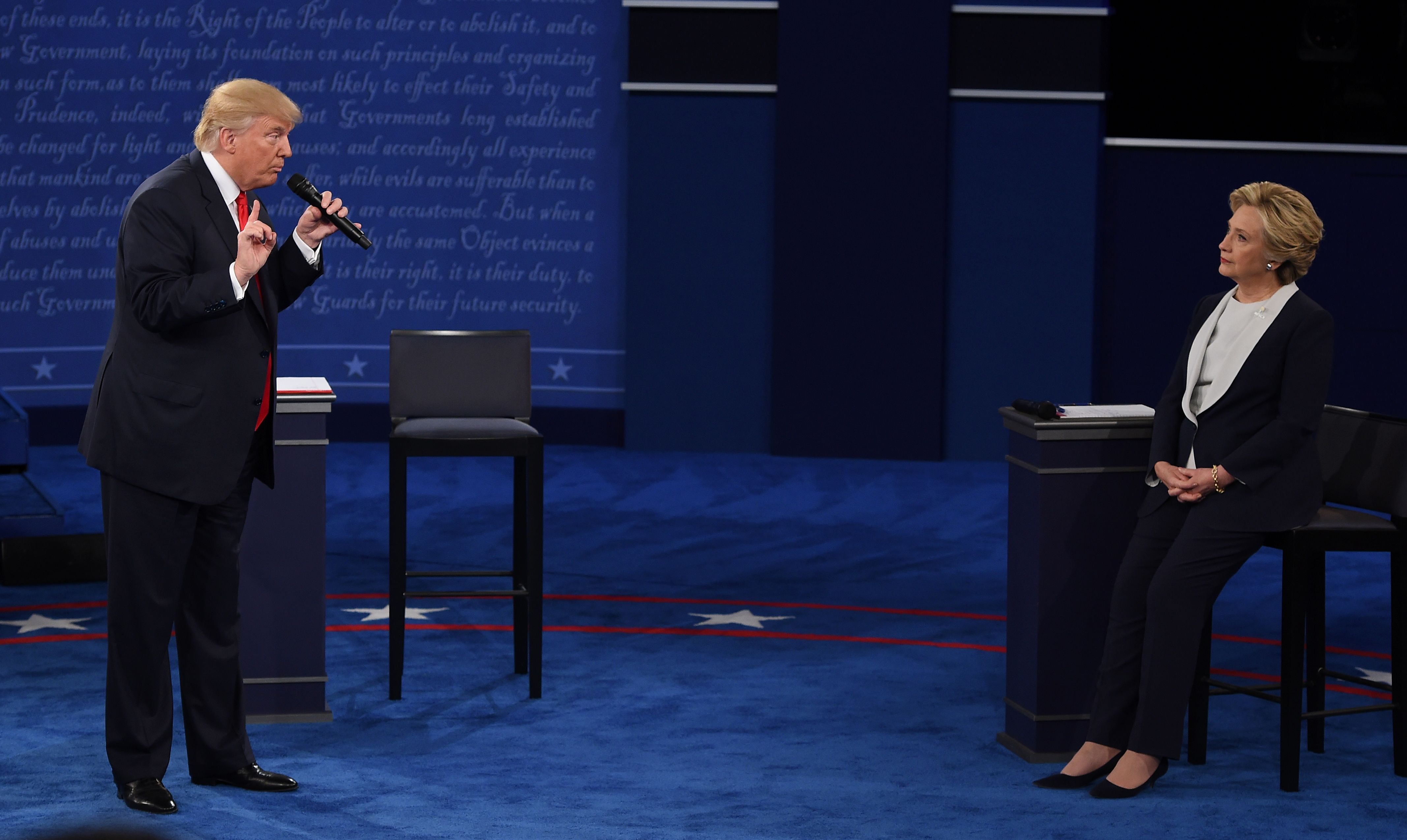 Democratic presidential candidate Hillary Clinton and Republican presidential candidate Donald Trump debate during the second presidential debate at Washington University in St. Louis on Oct. 9, 2016.