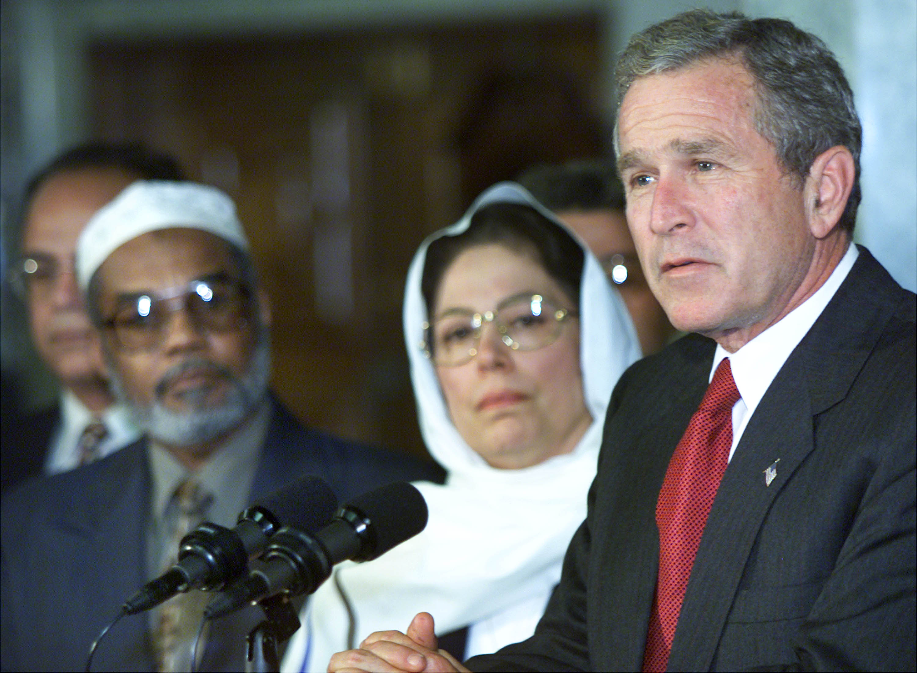 President George W. Bush speaks at an Islamic center, to try to put an end to rising anti-Muslim sentiment, on September 17, 2001. (Mark Wilson—Getty Images)