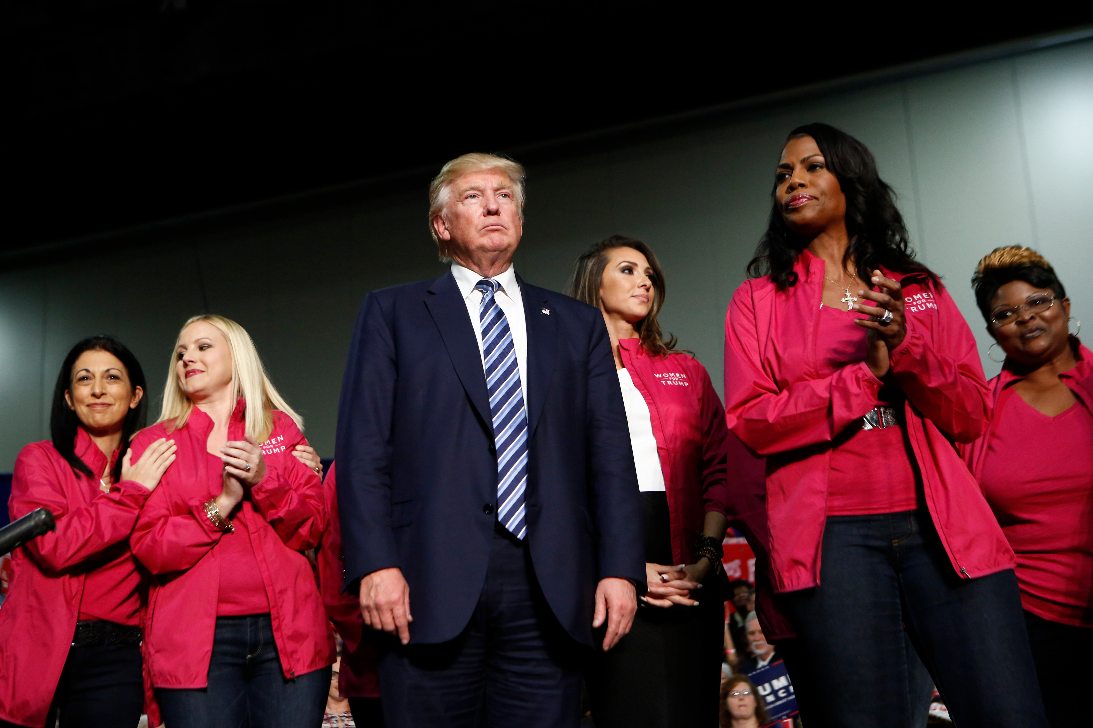 Republican presidential candidate Donald Trump stands with Women for Trump as he speaks to supporters at a rally on October 14, 2016 in Charlotte, North Carolina. Recent polls show the nominee has low support from the gender. (Brian Blanco&mdash;Getty Images)