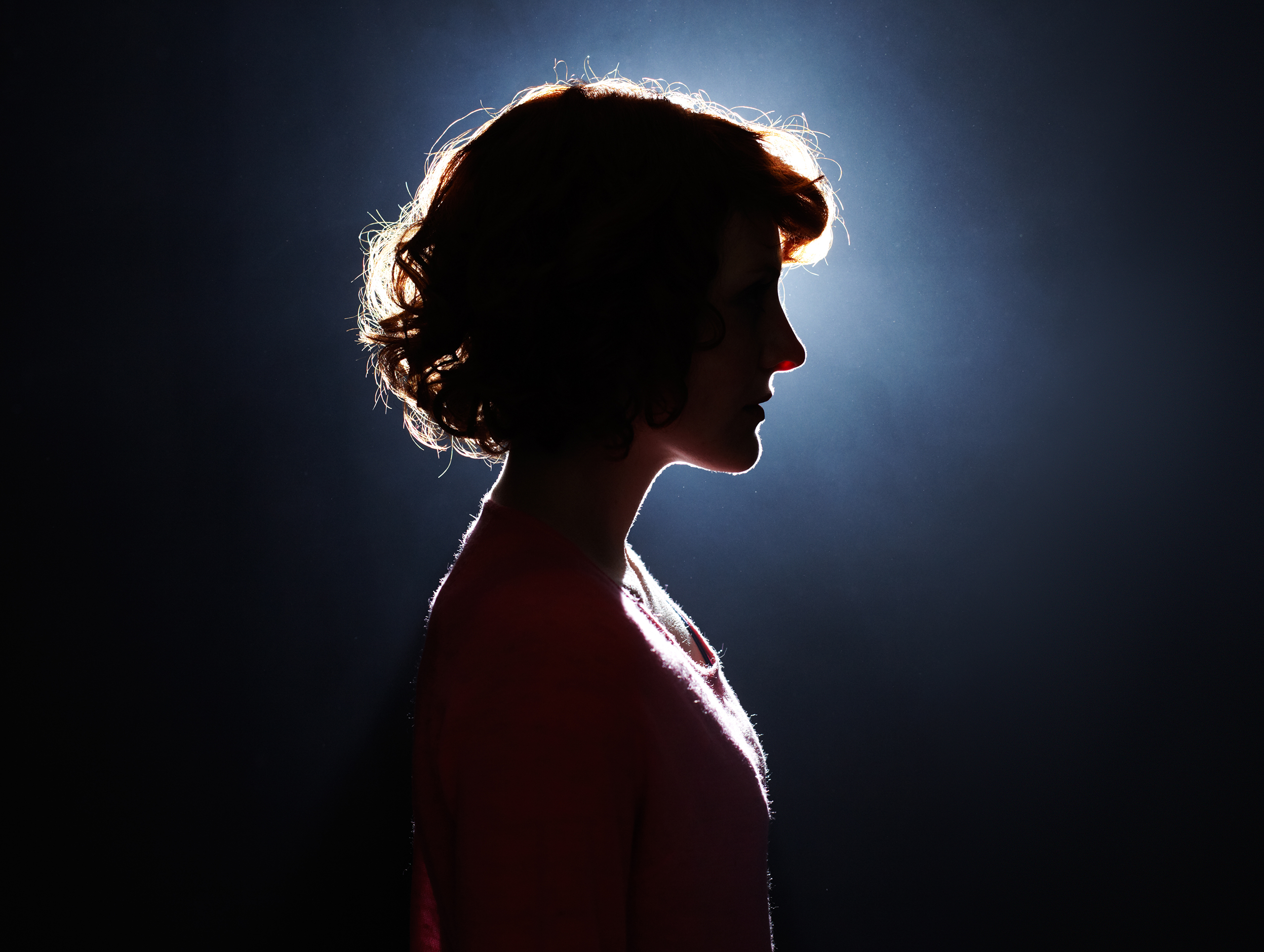 Silhouette of young woman.
