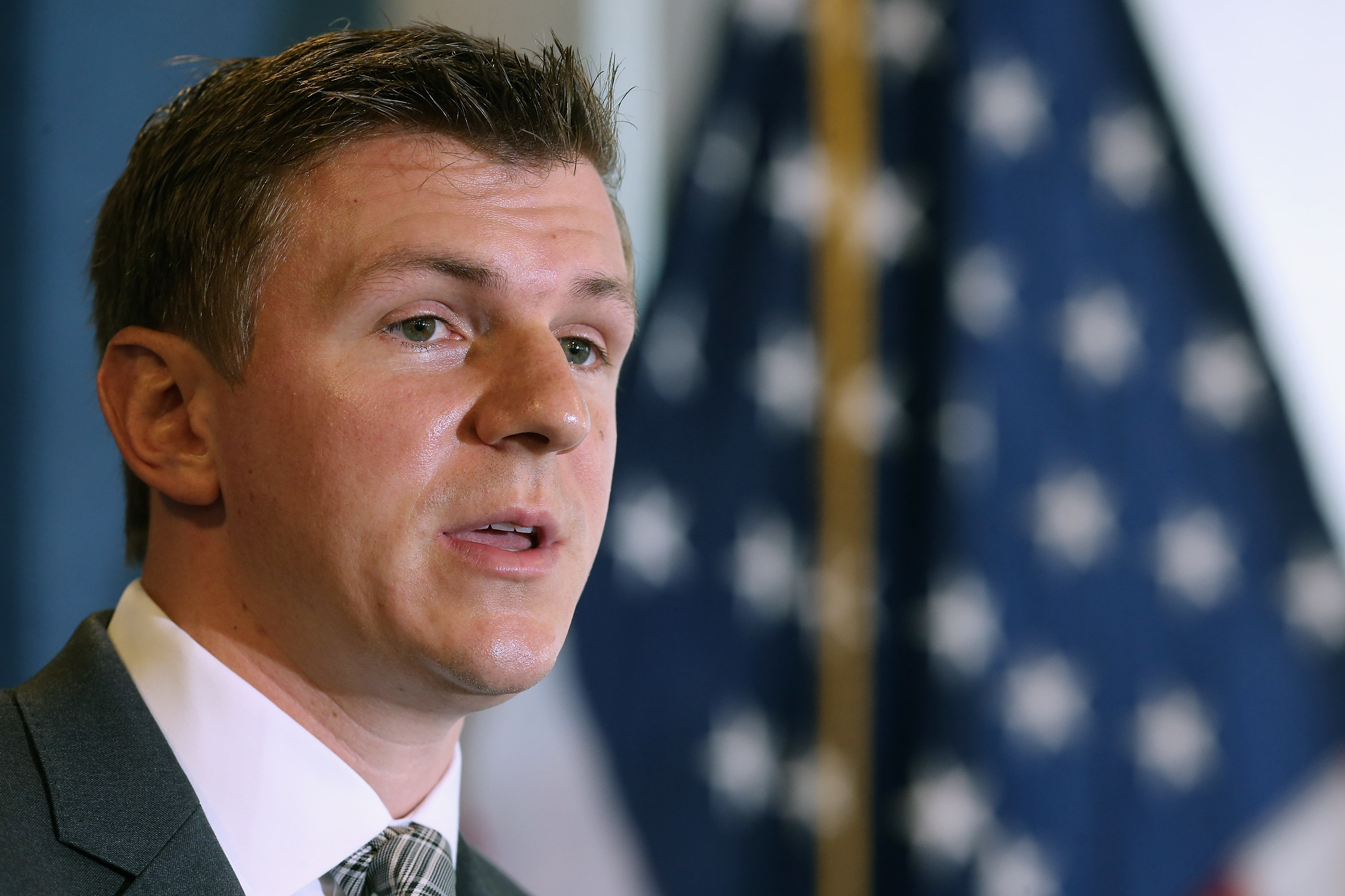 Conservative undercover journalist James O'Keefe (R) holds a news conference at the National Press Club in 2015. (Chip Somodevilla—Getty Images)