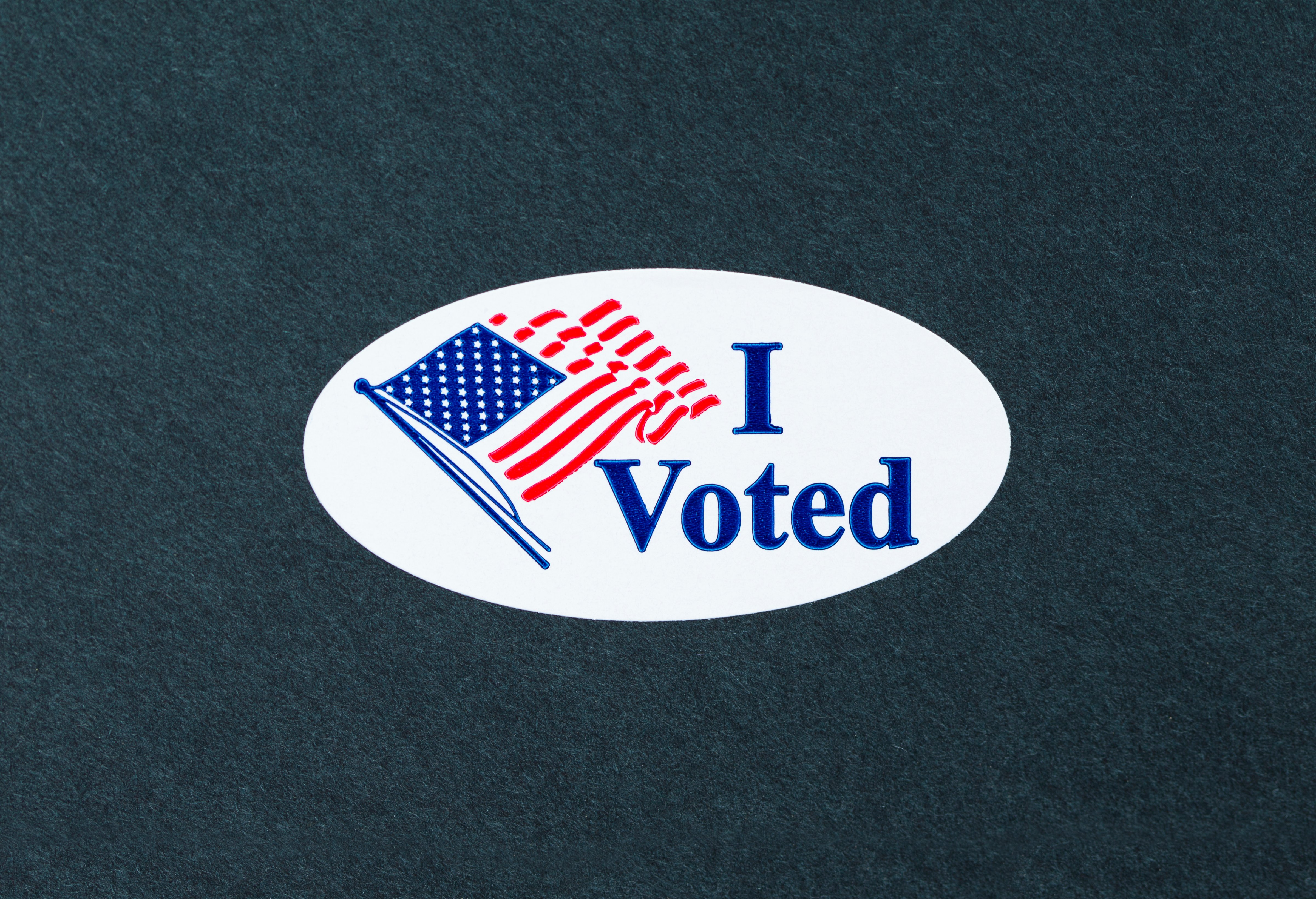'I Voted' sticker on the black background. (Getty Images)