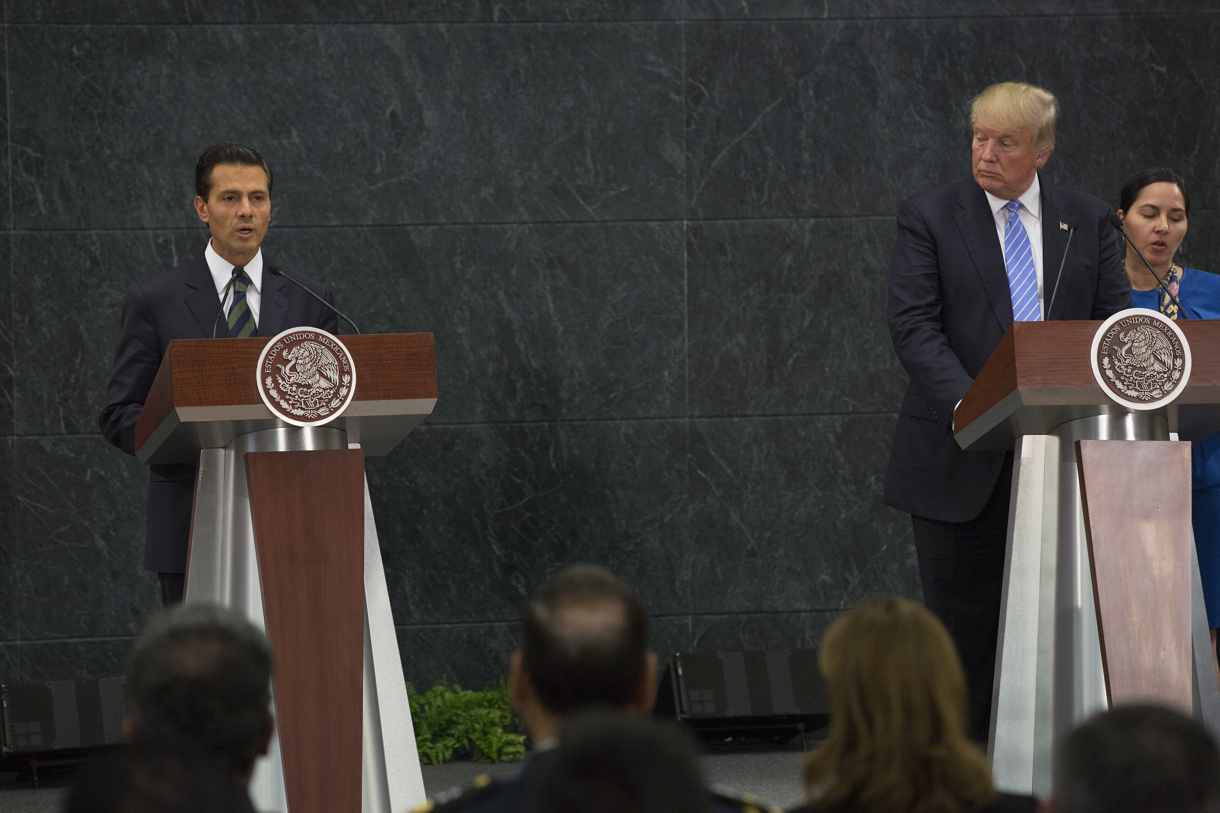 Enrique Pena Nieto, Mexico's president, left, speaks as Donald Trump, 2016 Republican presidential nominee, listens during a joint conference in Mexico City, Mexico, on Wednesday, Aug. 31, 2016. Bloomberg&mdash;Bloomberg via Getty Images (Bloomberg&mdash;Bloomberg via Getty Images)