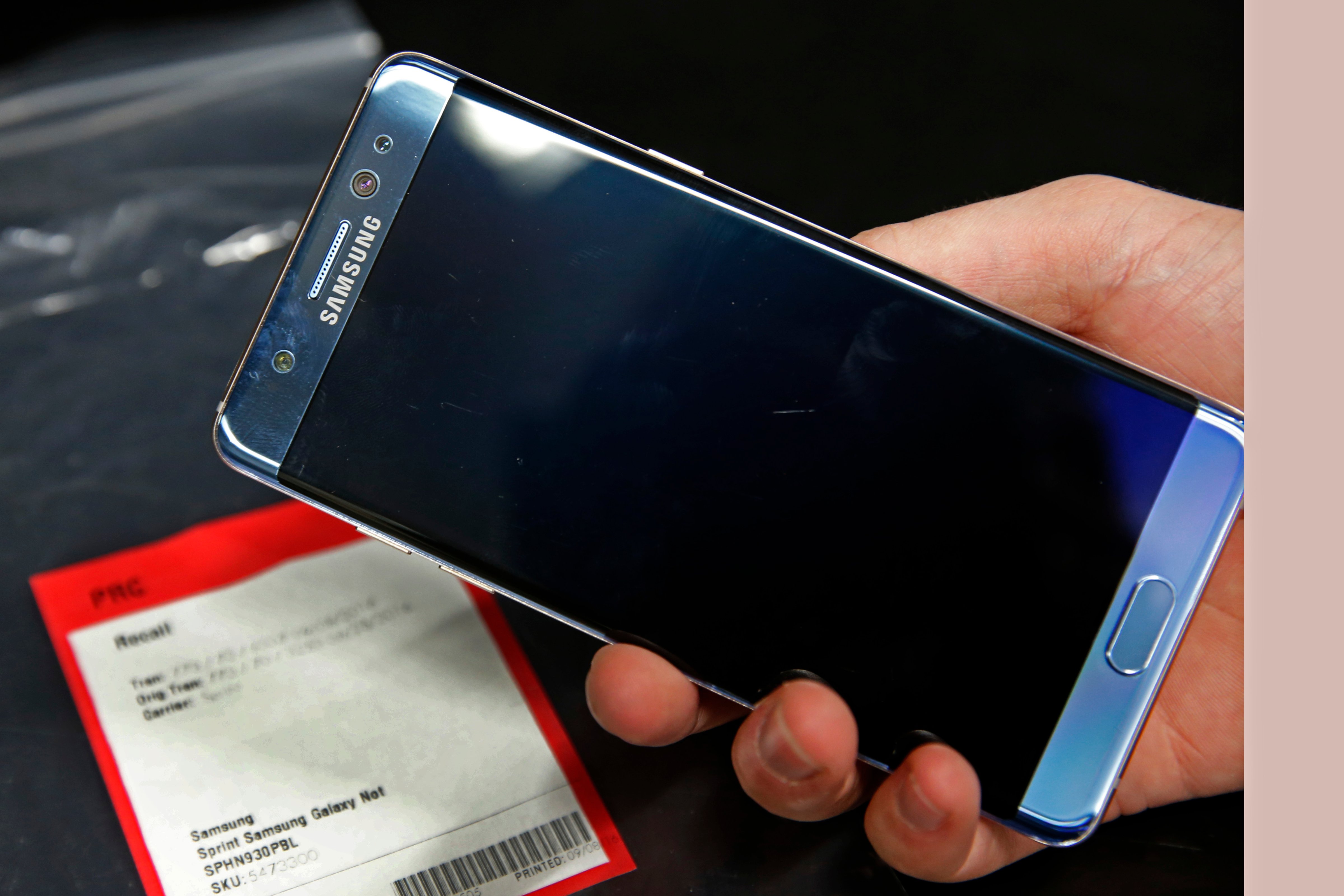 A Samsung Galaxy Note 7 is held up with other Note 7 phones on a counter that were returned to a Best Buy on September 15, 2016 in Orem, Utah. (George Frey&mdash;Getty Images)