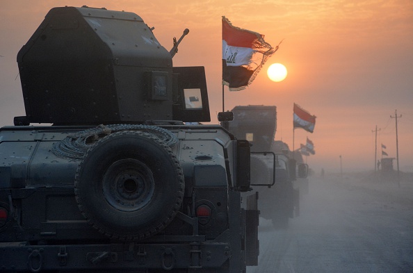 Iraqi forces preparing for the long-awaited assault on Mosul that began Monday. (MAHMOUD AL-SAMARRAI / AFP / Getty Images)