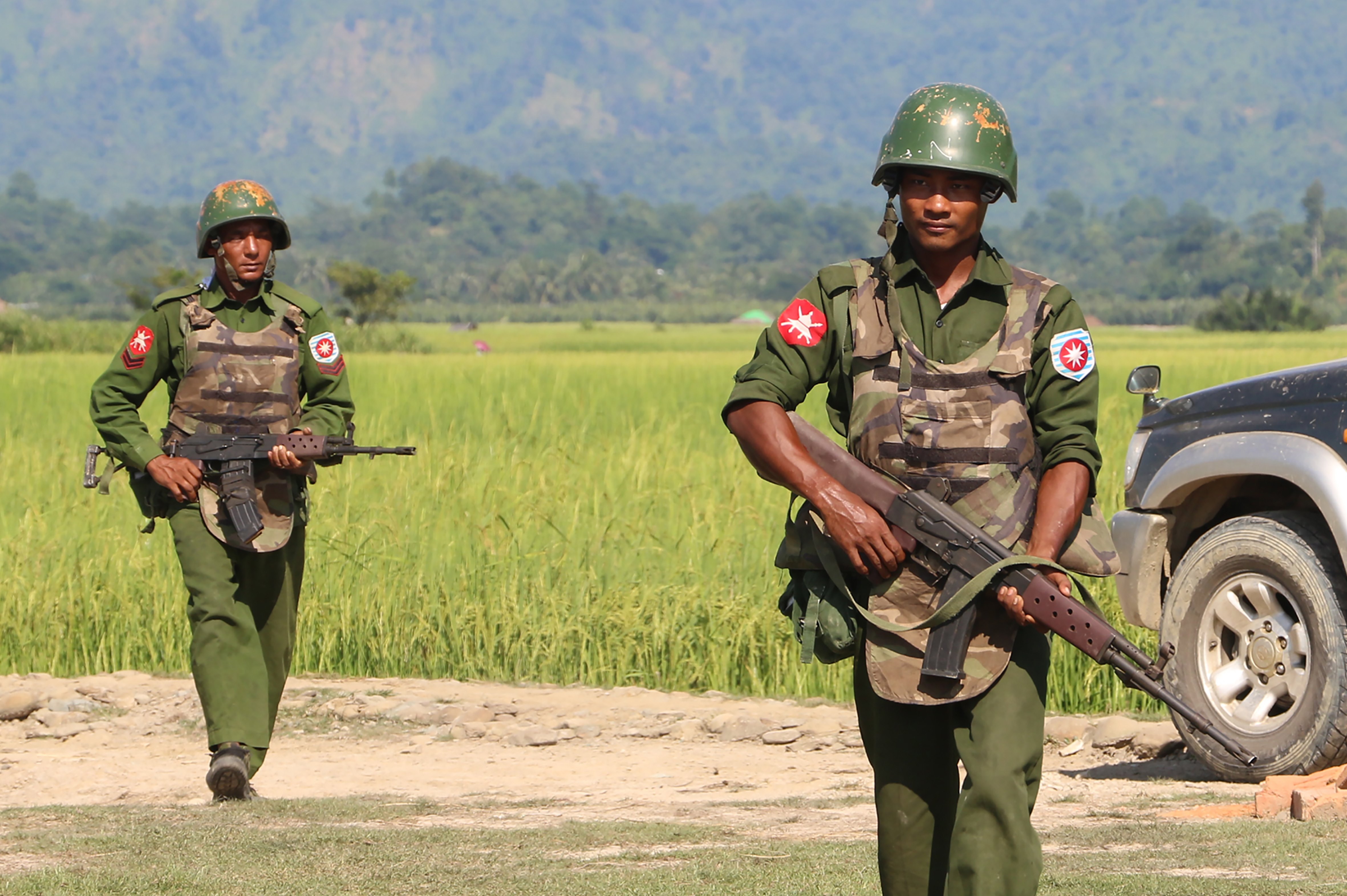 Burmese army soldiers patrol a village in Maungdaw, in Burma, as security operations continue in Arakan state on Oct. 21, 2016 (STR—AFP/Getty Images)