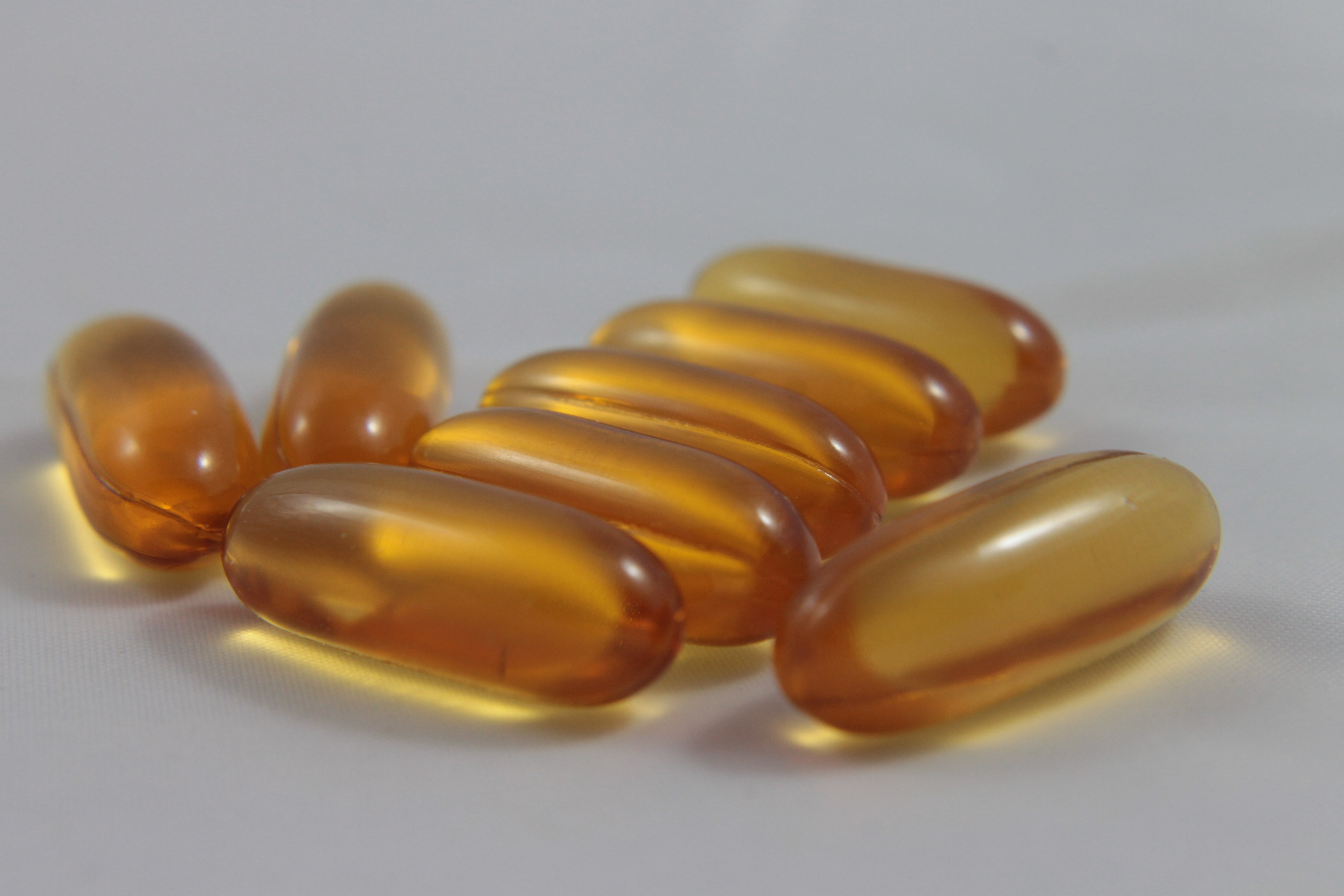 Close-Up Of Omega-3 Capsules On Table