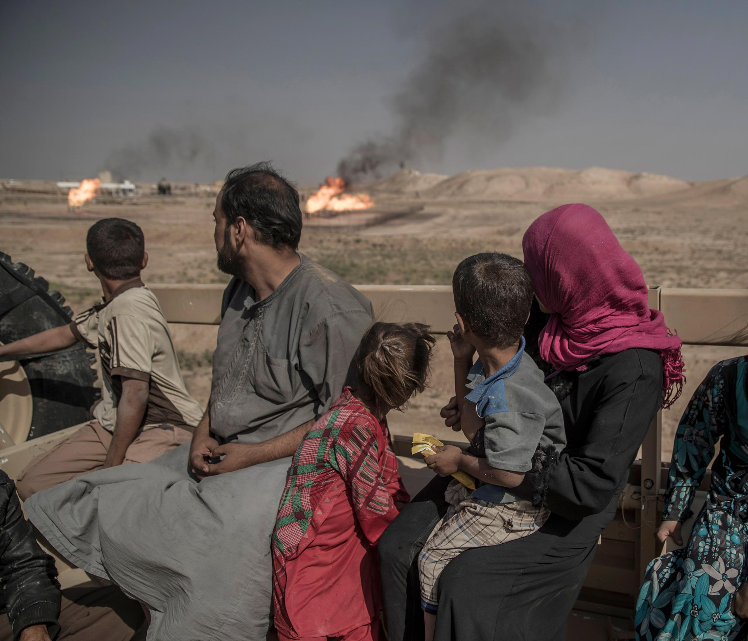 In the mountains outside Mosul, a group of twelve, including men, women and children who escaped from an IS-controlled village, have sought refuge with the Kurdish Peshmerga forces on the frontline in Kurdistan, Iraq, Sept. 2016