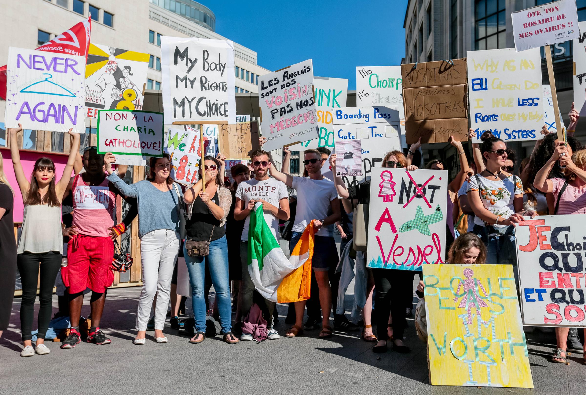 Demonstrators gather and hold banners to protest for the repeal of the Eighth Amendment to the Irish Constitution in Brussels, Belgium, on Sept. 24, 2016. The Eighth Amendment to the Constitution is the law against abortion in Ireland.