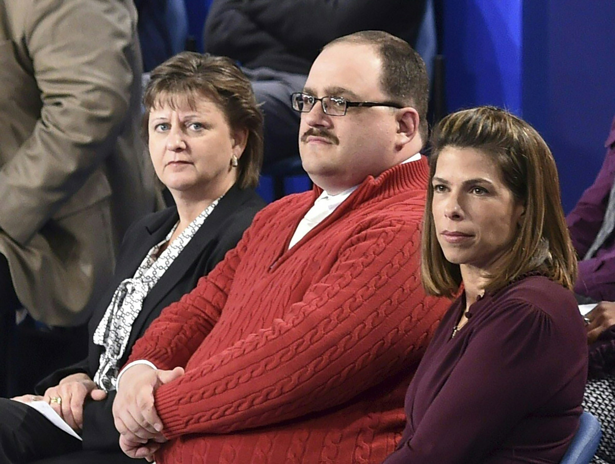 Ken Bone (C) listens to US Democratic nominee Hillary Clinton and Republican nominee Donald Trump during the second presidential debate at Washington University in St. Louis on Oct. 9, 2016. (Paul J. Richards—AFP/Getty Images)