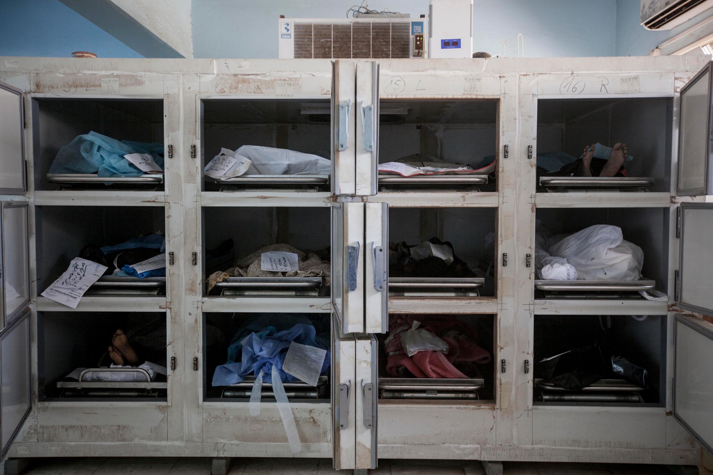 The bodies of Sub-Saharan migrants lie in a morgue in Sabha City, Libya.