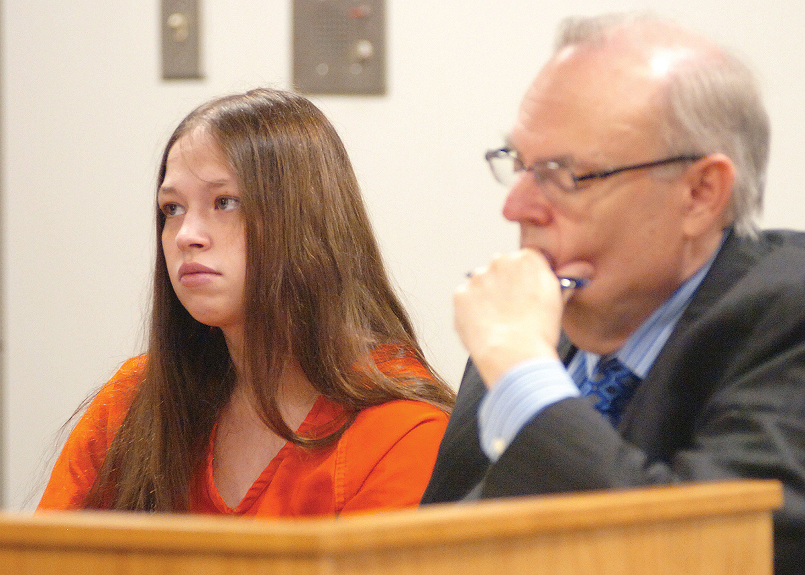 Brittany Pilkington appears for arraignment on three capital murder charges with her attorney Marc S. Triplett in Logan County Common Pleas Court in Bellefontaine, Ohio, on Aug. 26, 2015. Pilkington is charged with suffocating her three sons over a 13-month period. (Joel E. Mast—Bellefontaine Examine/AP)