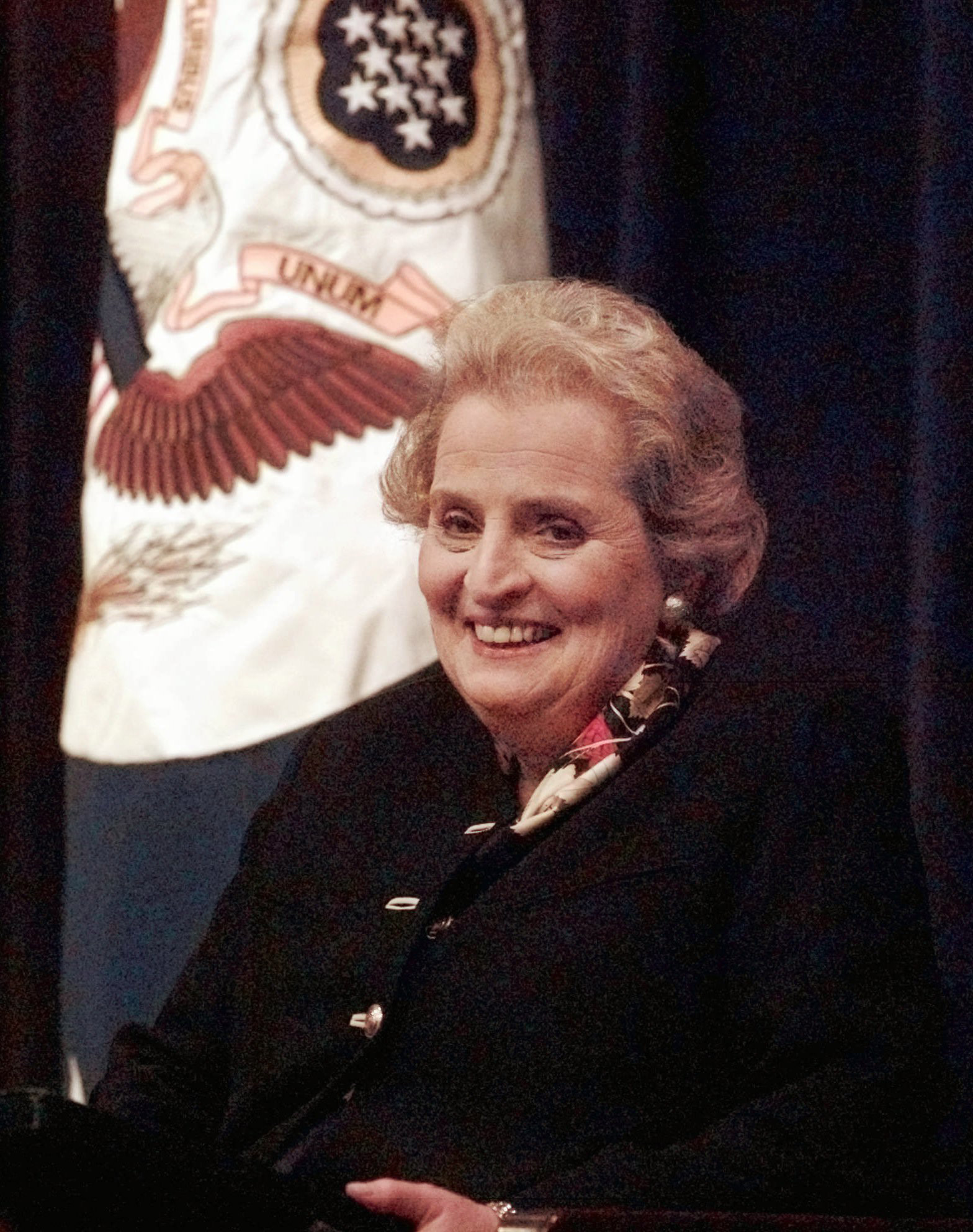 Secretary of State Madeleine Albright smiles while meeting with State Department employees during a town hall meeting at the State Department in Washington Monday Jan. 27, 1997.